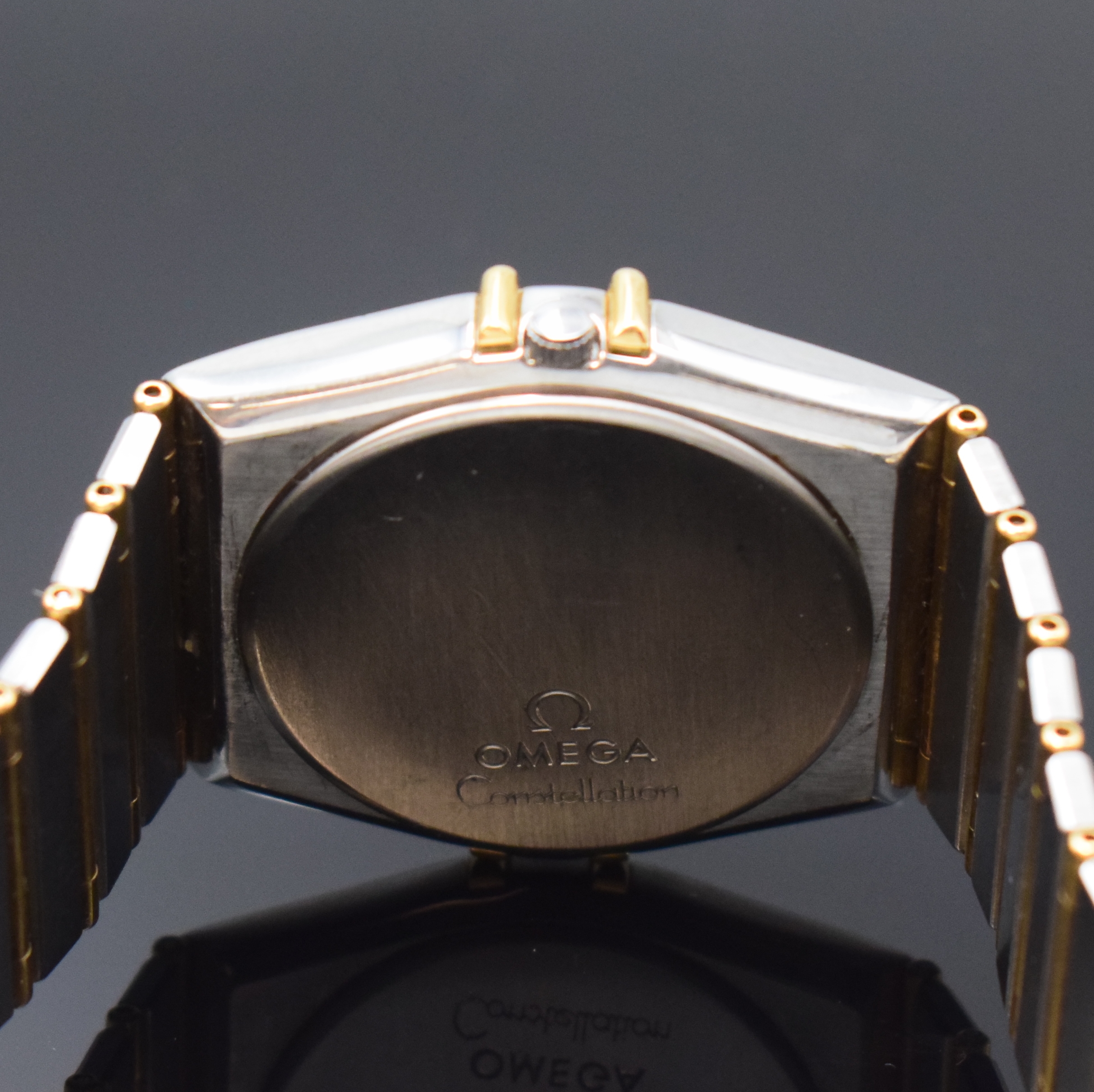 Detail d: OMEGA Herrenarmbanduhr Constellation Referenz 396.1070 / 396.1080, Schweiz um 1990, quarz, Edelstahl/Gold kombiniert inkl. Gliederband m. Faltschl., ...