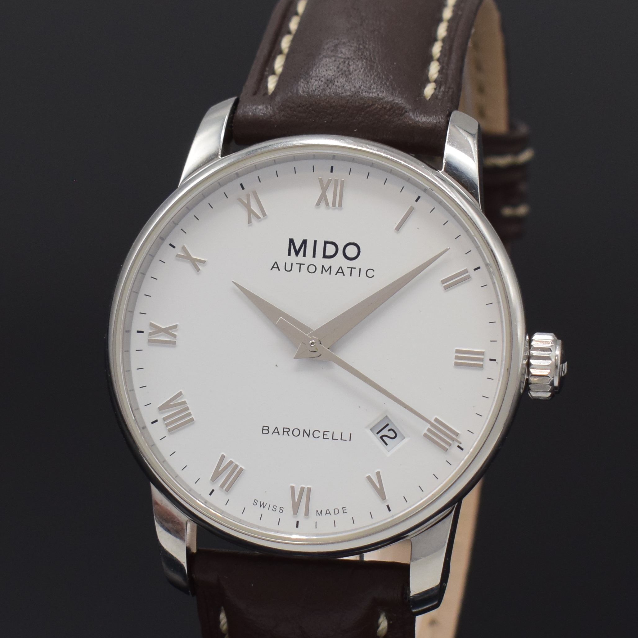 Detail a: MIDO Herrenarmbanduhr Serie Baroncelli Referenz 8600, Schweiz um 2000, Automatik, Edelstahlgeh. inkl. neutr. Lederband m. orig. dopp. Faltschl., ...