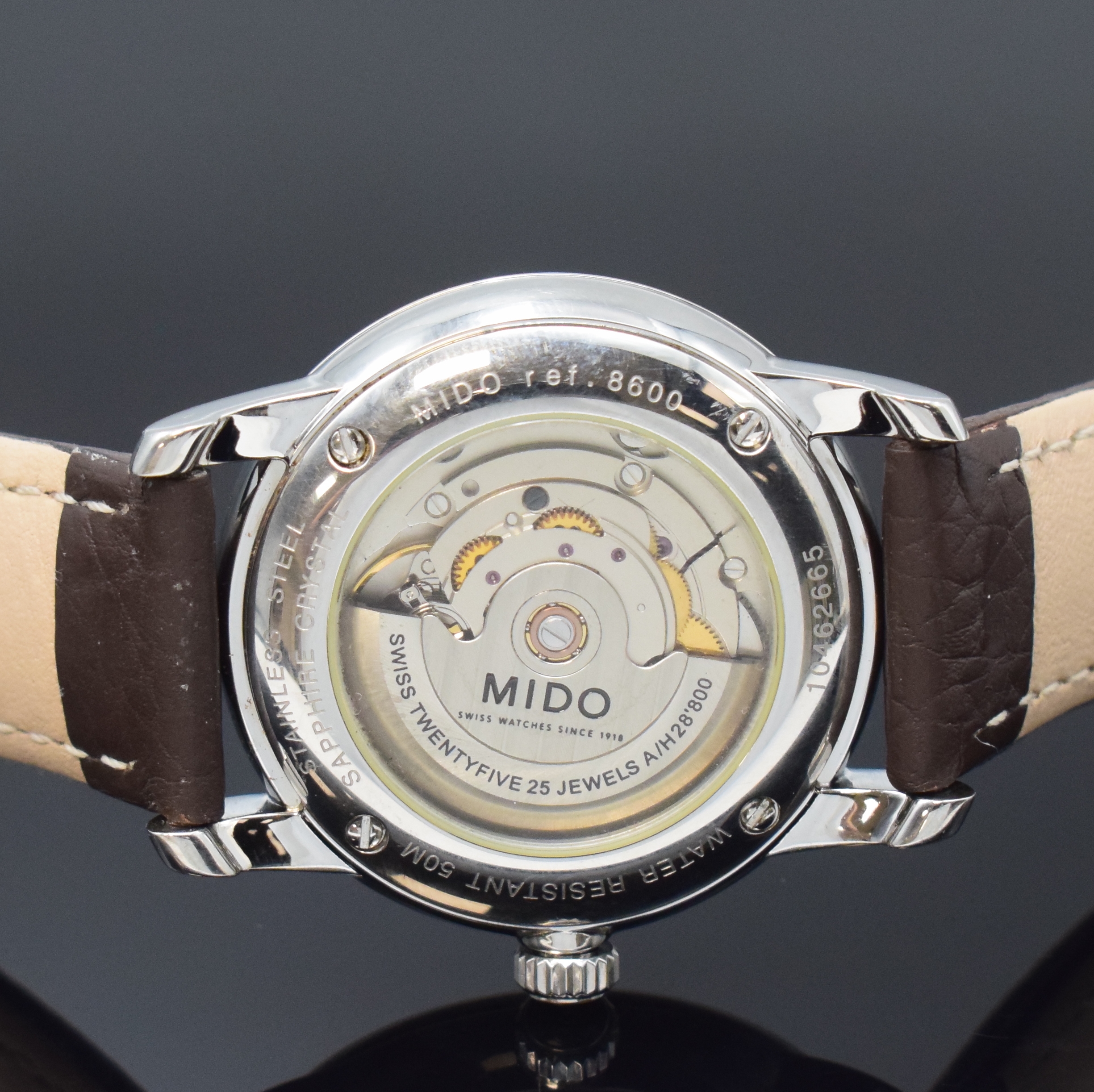Detail e: MIDO Herrenarmbanduhr Serie Baroncelli Referenz 8600, Schweiz um 2000, Automatik, Edelstahlgeh. inkl. neutr. Lederband m. orig. dopp. Faltschl., ...