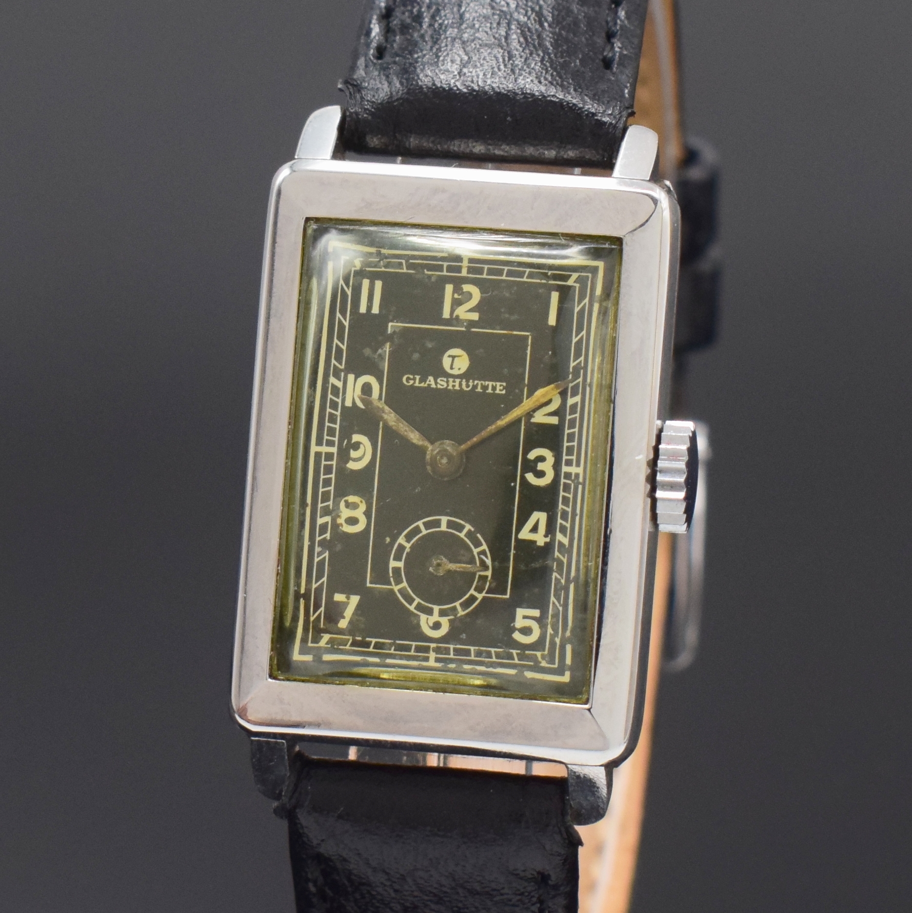 Detail a: TUTIMA rechteckige Armbanduhr in Stahl Kaliber UROFA 58, Deutschland um 1935, Handaufzug, Scharniergeh. rücks. bez."Uhrenfabrik AG Glashütte ...