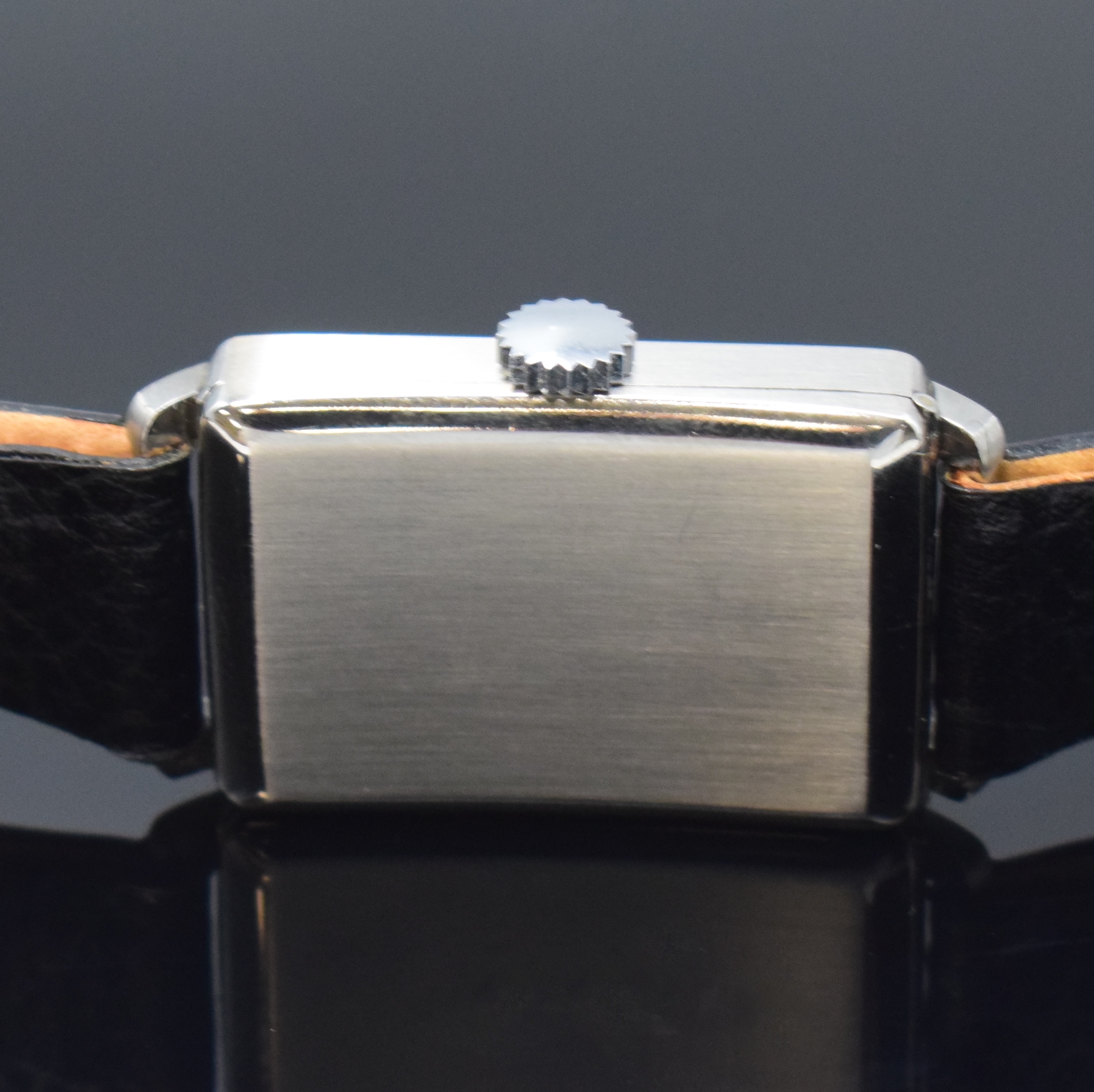 Detail c: TUTIMA rechteckige Armbanduhr in Stahl Kaliber UROFA 58, Deutschland um 1935, Handaufzug, Scharniergeh. rücks. bez."Uhrenfabrik AG Glashütte ...