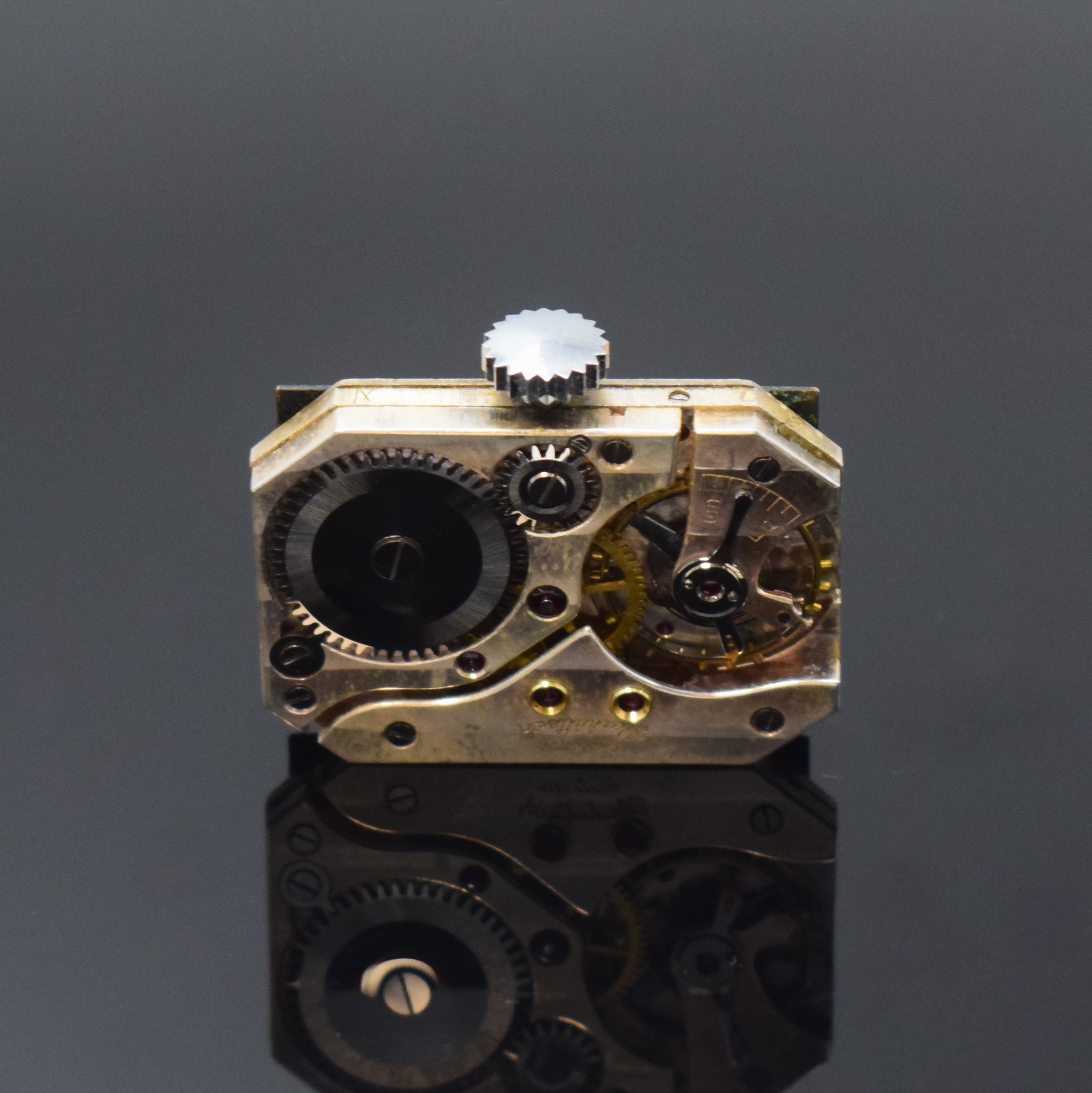 Detail d: TUTIMA rechteckige Armbanduhr in Stahl Kaliber UROFA 58, Deutschland um 1935, Handaufzug, Scharniergeh. rücks. bez."Uhrenfabrik AG Glashütte ...