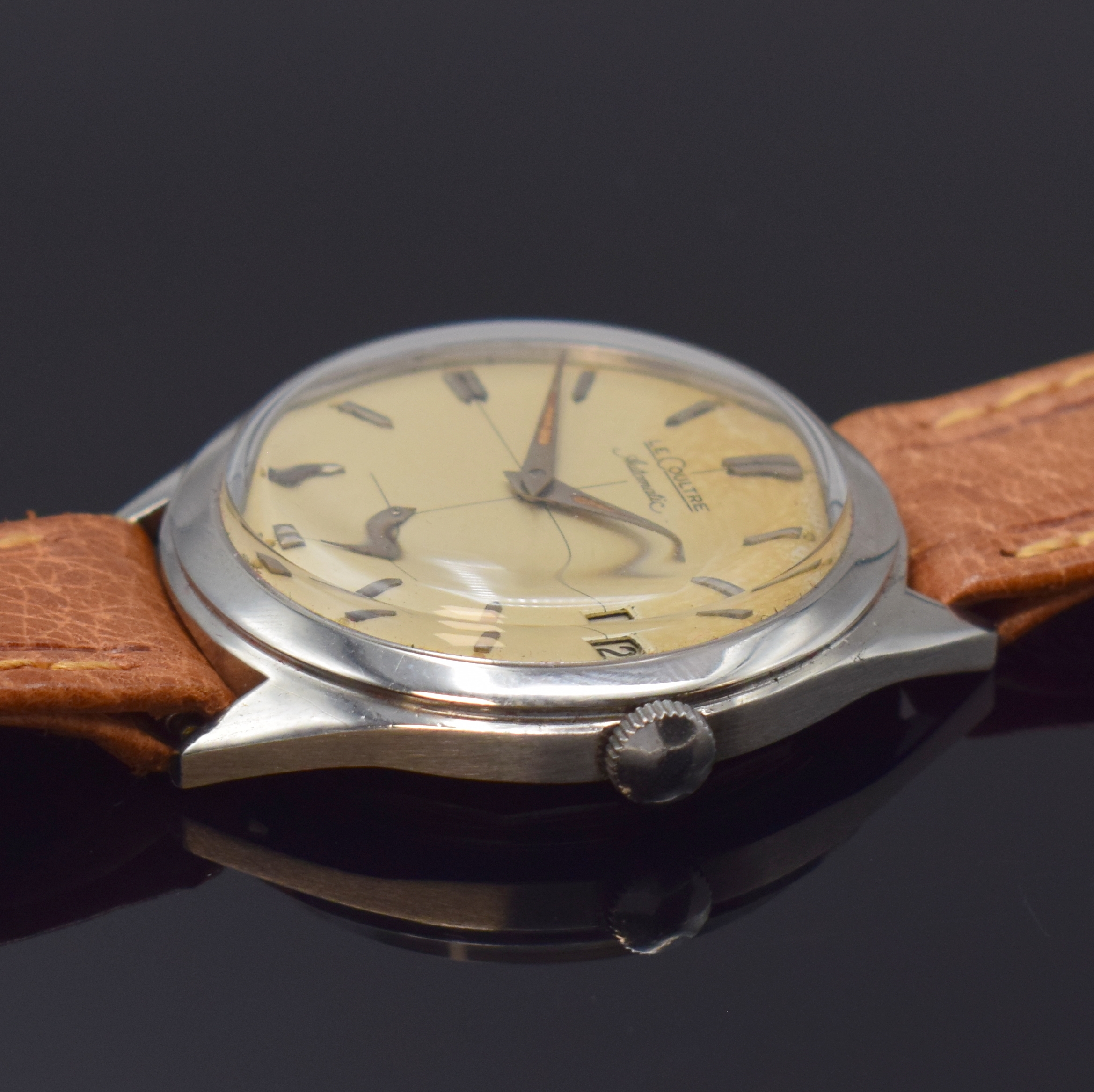 Detail b: LeCOULTRE Herrenarmbanduhr mit Hammerautomatik in Stahl, Schweiz 1950er Jahre, sign. Geh., Boden verschr., silb. Zifferbl. pat./fl., silb. Std.-Ind., ...