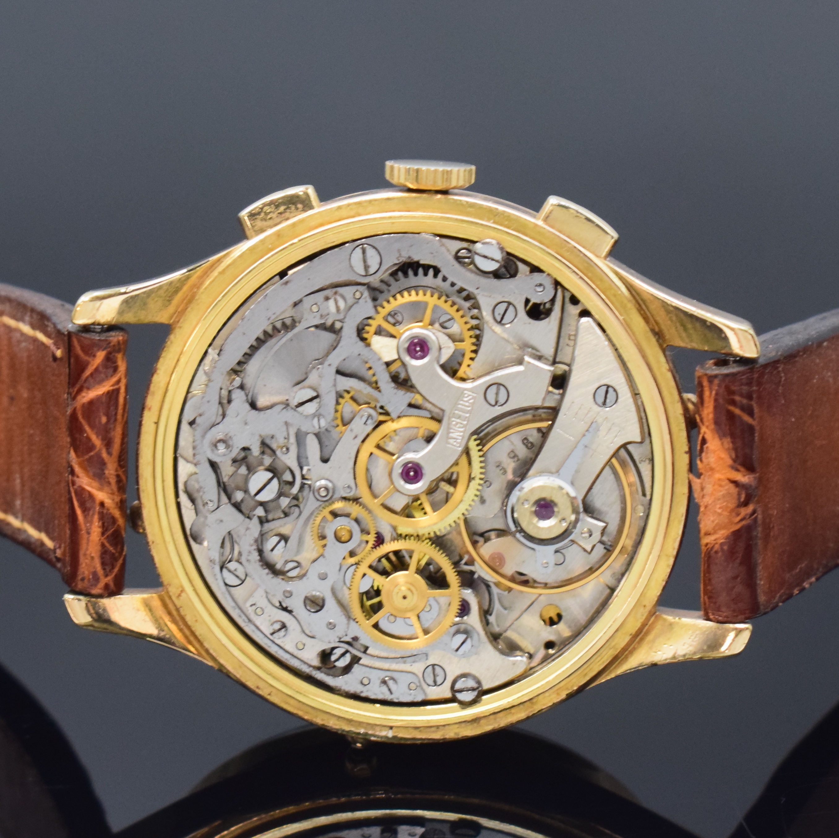 Detail e: ANGELUS Chrono-Dato Armbandchronograph mit Vollkalender, Schweiz um 1945, Handaufzug, verg. Geh. m. seitl. Korrekturdrückern, Stahlboden aufgedr., ...
