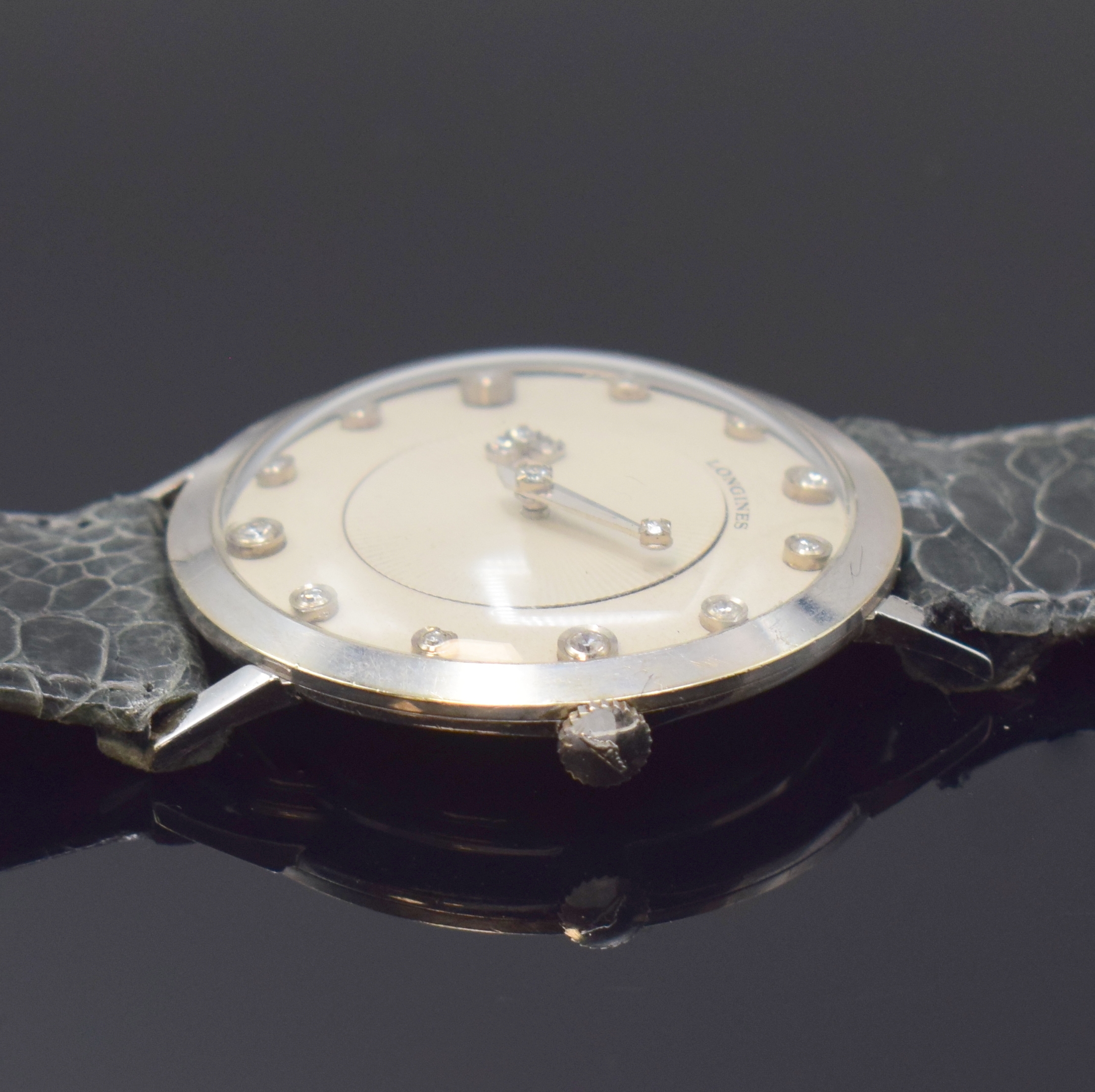 Detail b: LONGINES Mysterieuse Armbanduhr in WG 585/000, Schweiz/USA um 1958, Handaufzug, 2-tlg. Geh., Boden aufgedr., orig. Krone, matt-silb. Zifferbl., ...