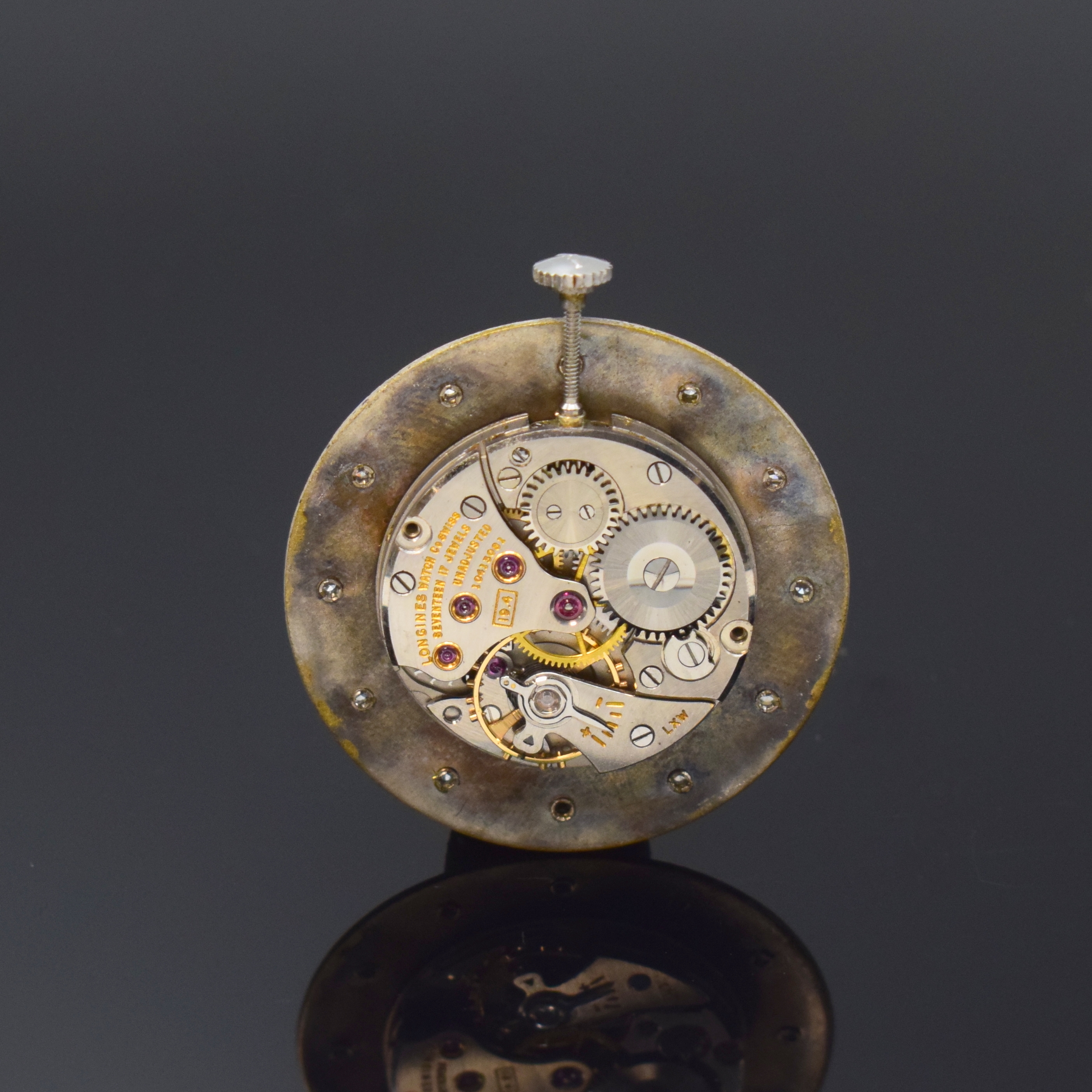 Detail e: LONGINES Mysterieuse Armbanduhr in WG 585/000, Schweiz/USA um 1958, Handaufzug, 2-tlg. Geh., Boden aufgedr., orig. Krone, matt-silb. Zifferbl., ...