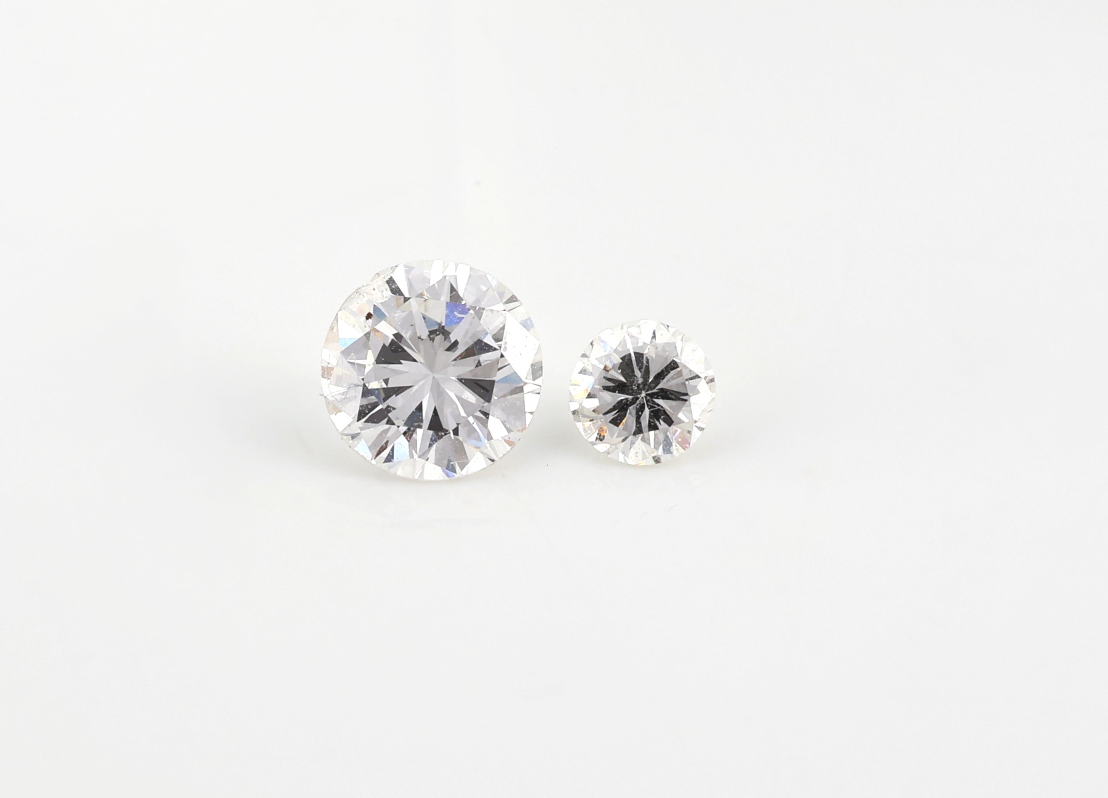 Detail b: Lot lose Diamanten, zus. ca. 4.32 ct Weiß- l.get.Weiß/si-p, Ausfassware