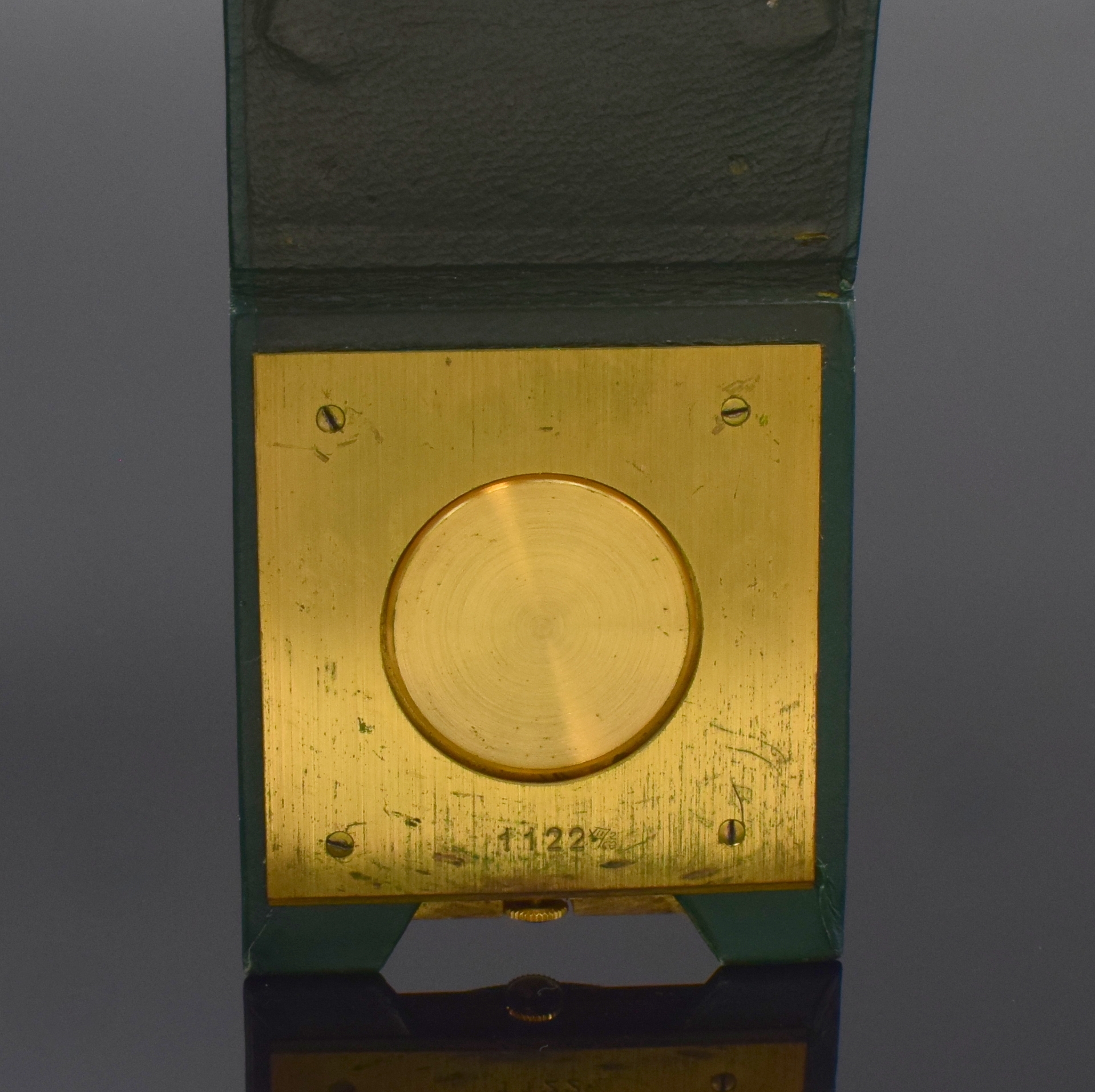 Detail c: TÜRLER Reiseuhr mit Weltzeitanzeige, Schweiz um 1960, Handaufzug, verg. Gehäuse im Lederetui, drehbare Lünette m. Weltstädten und 24-Std.-Skala, ...