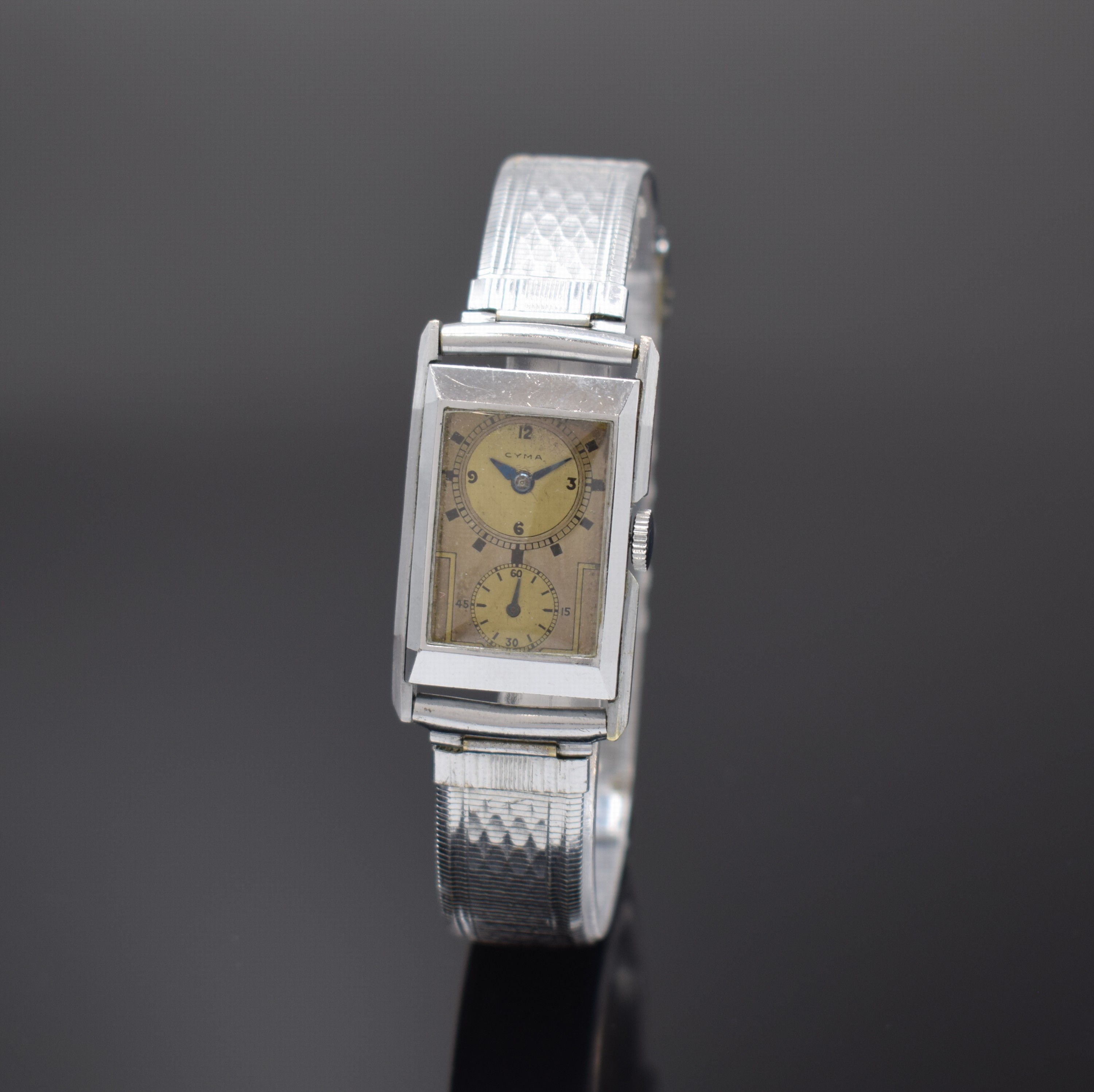 CYMA rechteckige Doctors Watch, Schweiz um 1935, Handaufzug, verchr. Geh., Stahlboden aufgedr., verchr. orig. Band, silb. Duoton- Zifferbl. ...