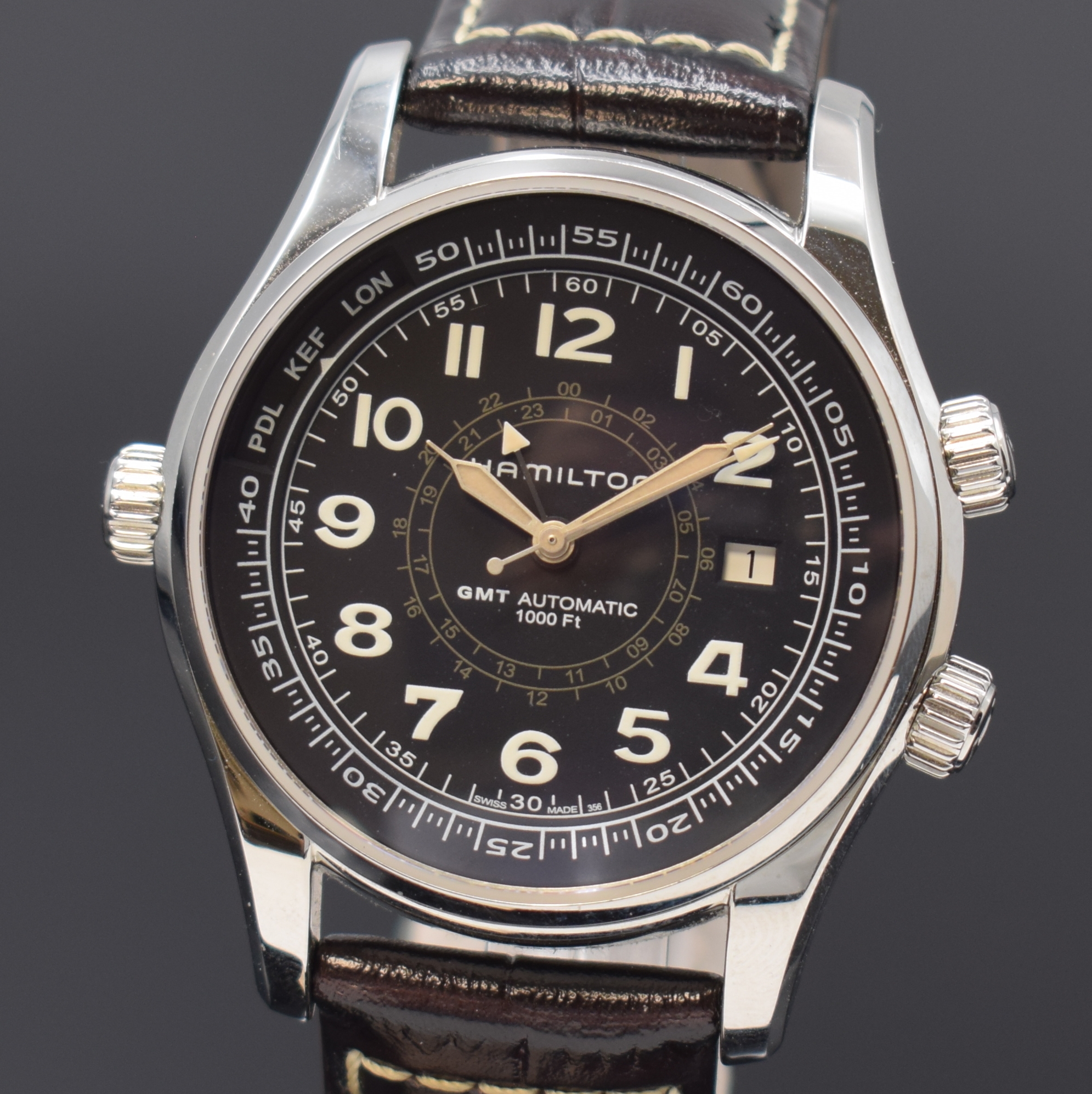 Detail a: HAMILTON Herrenarmbanduhr Khaky Navy UTC Referenz H775050, Automatik, Schweiz um 2015, Edelstahlgeh. inkl. Lederband m. Faltschl., Boden 6-fach ...