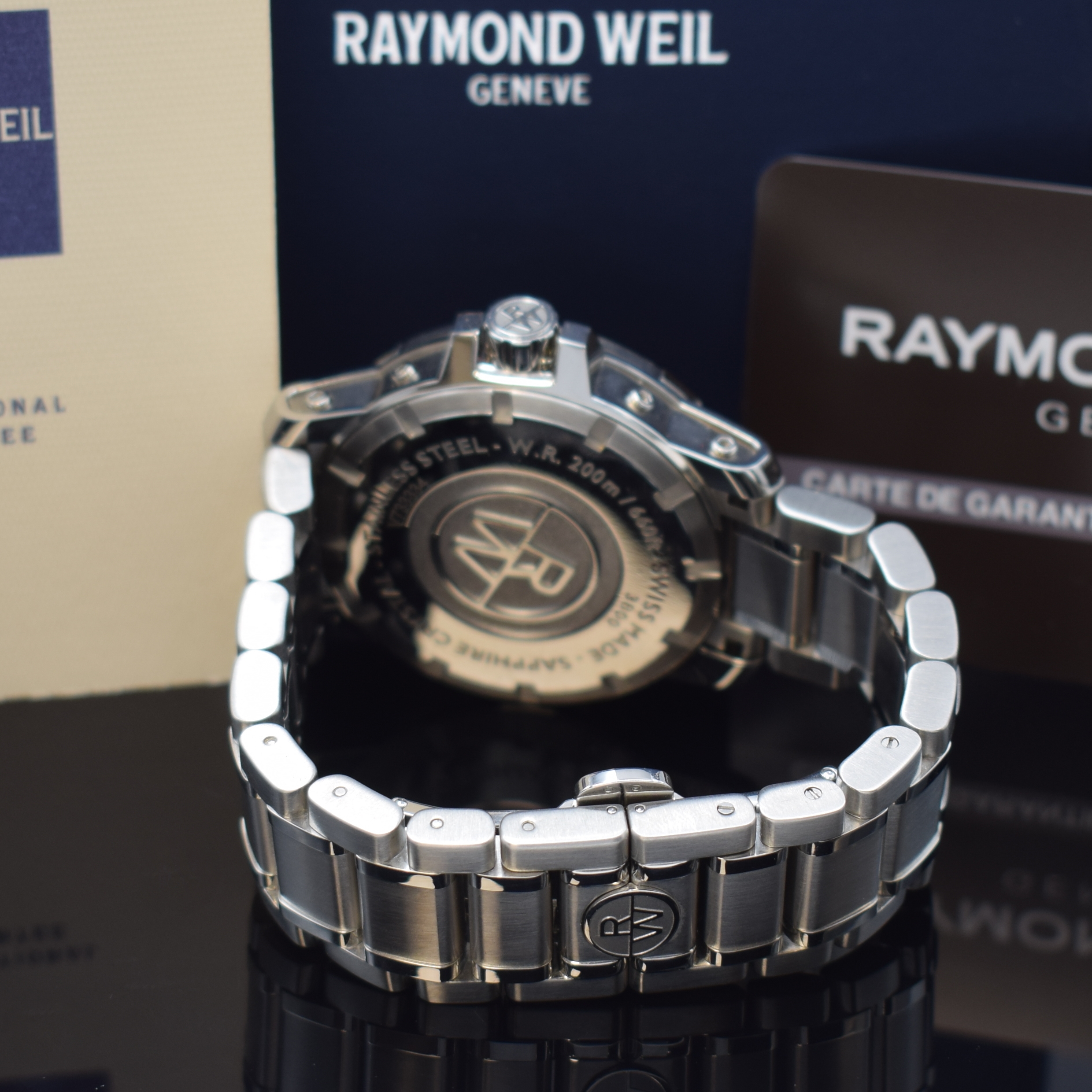 Detail b: RAYMOND WEIL Herrenarmbanduhr Nabucco GMT Referenz 3800, Automatik, Schweiz um 2015, massives Edelstahlgeh. inkl. Gliederband m. dopp. Faltschl., ...