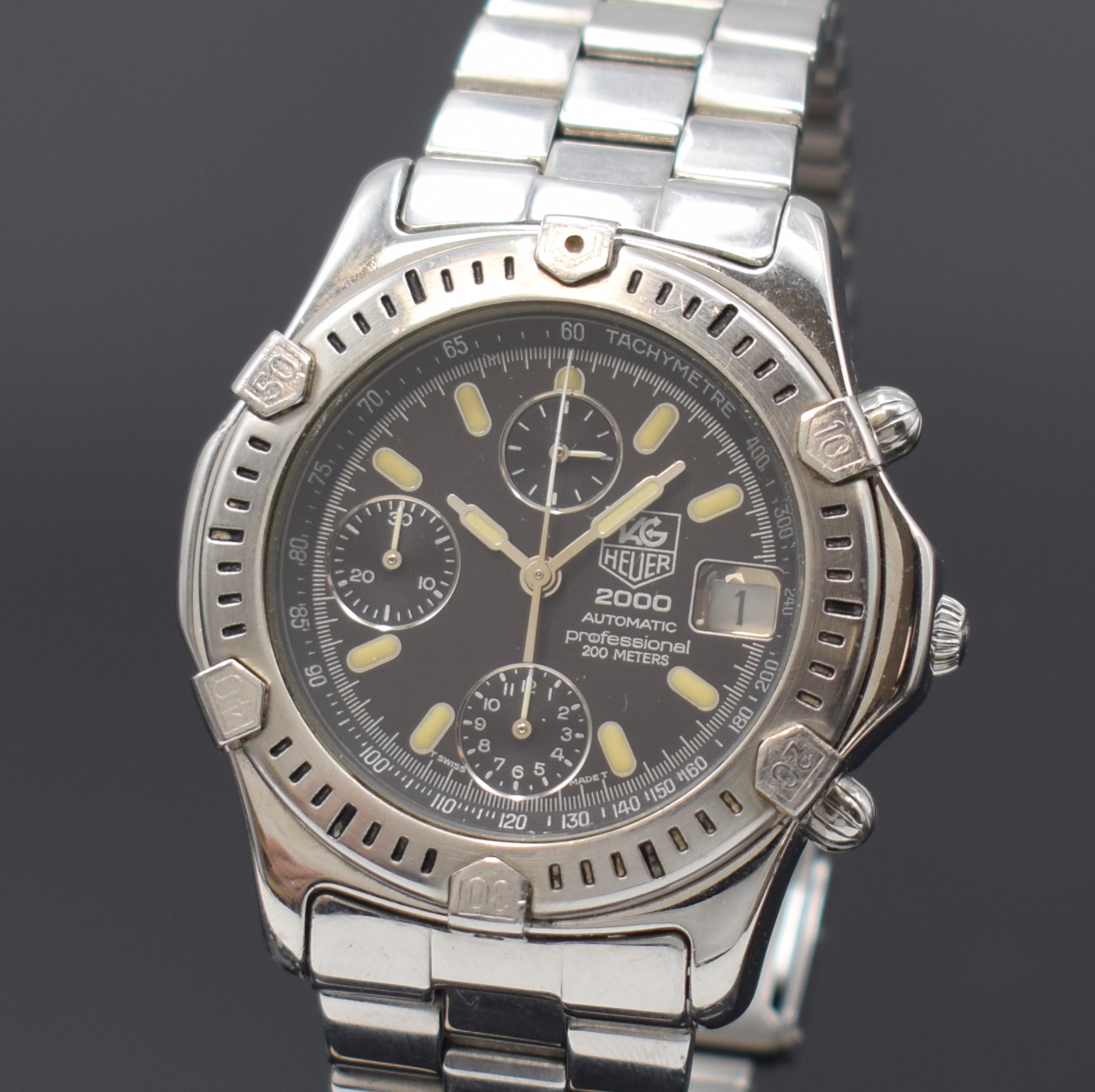 Detail a: TAG HEUER 2000 Armbandchronograph, Automatik, Schweiz um 1992, Edelstahlgeh. inkl. orig. Gliederband m. Faltschl., Boden verschr., schwarzes ...
