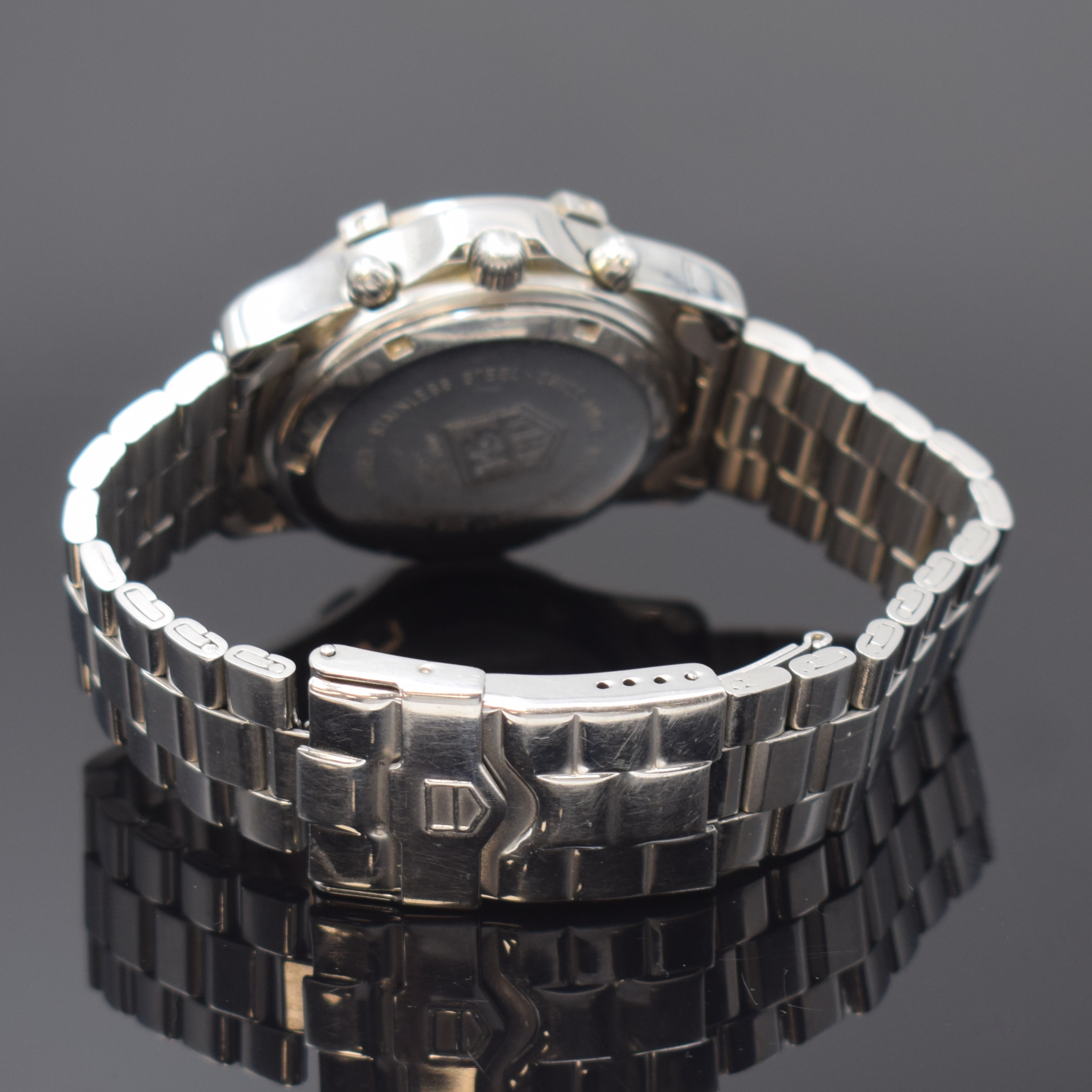 Detail b: TAG HEUER 2000 Armbandchronograph, Automatik, Schweiz um 1992, Edelstahlgeh. inkl. orig. Gliederband m. Faltschl., Boden verschr., schwarzes ...