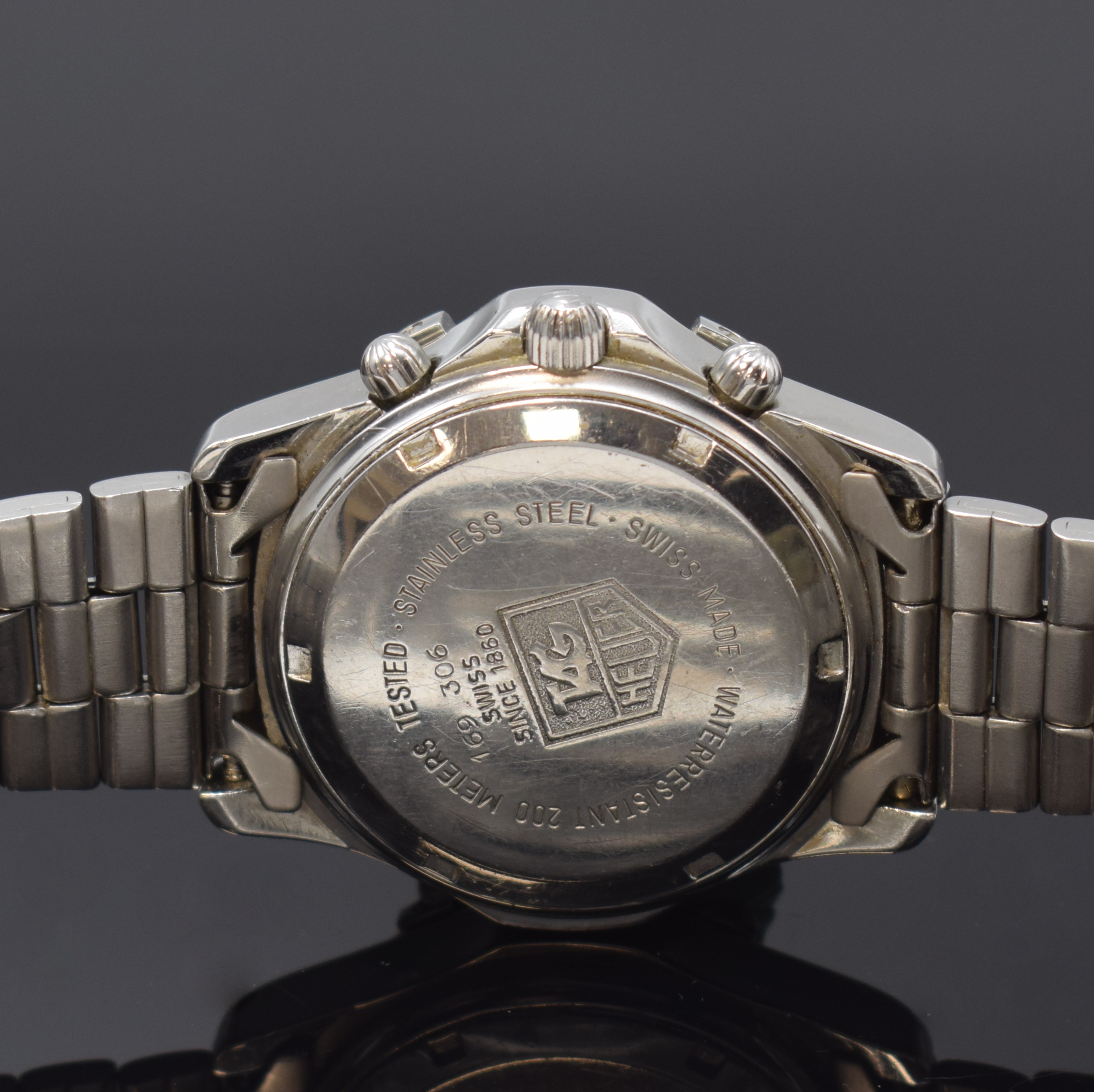 Detail d: TAG HEUER 2000 Armbandchronograph, Automatik, Schweiz um 1992, Edelstahlgeh. inkl. orig. Gliederband m. Faltschl., Boden verschr., schwarzes ...
