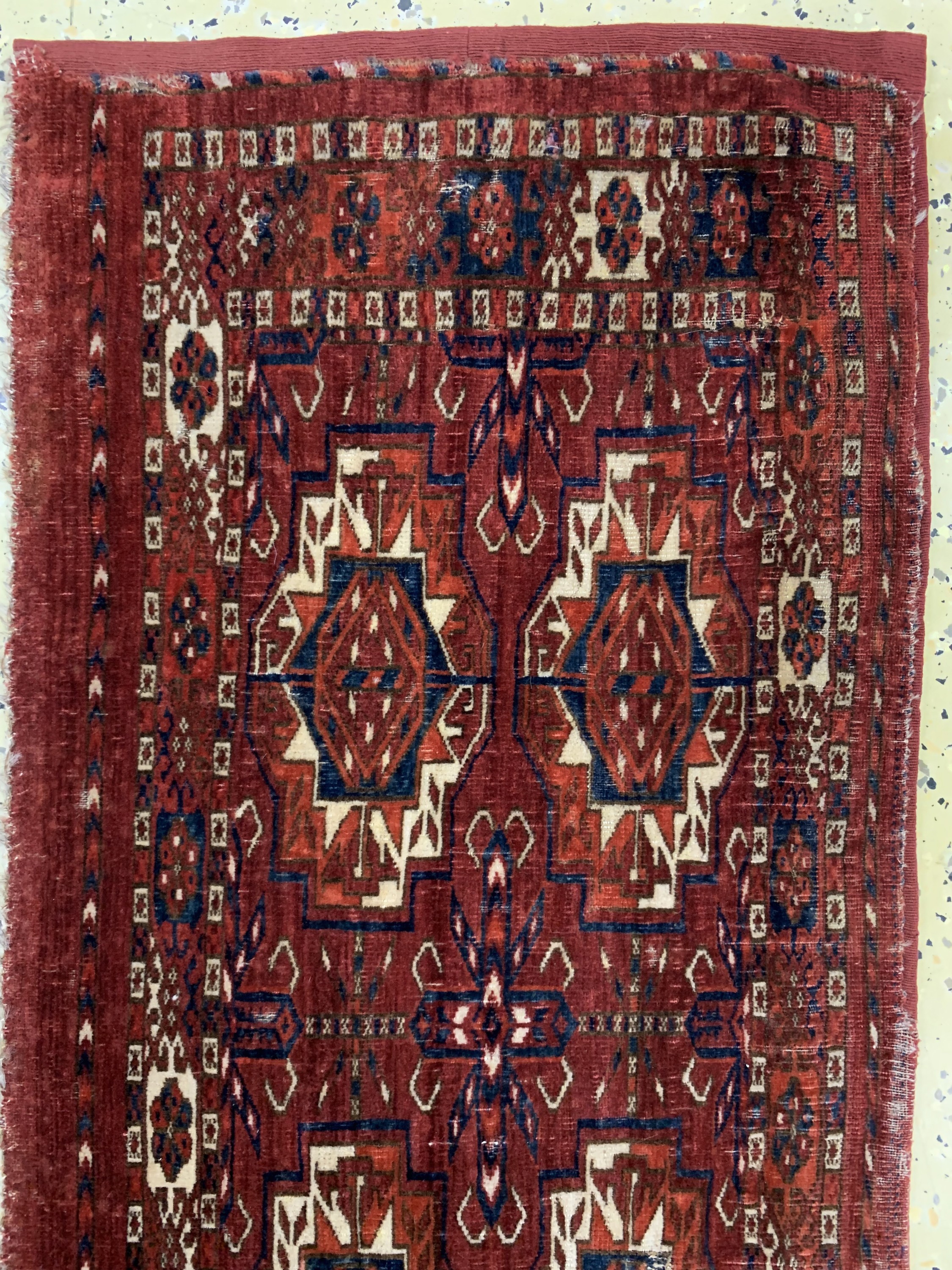 Detail a: Antiker Tekke Torba, Turkmenistan, Mitte 19.Jhd, Wolle auf Wolle, ca. 124 x 44 cm, EHZ:3-4