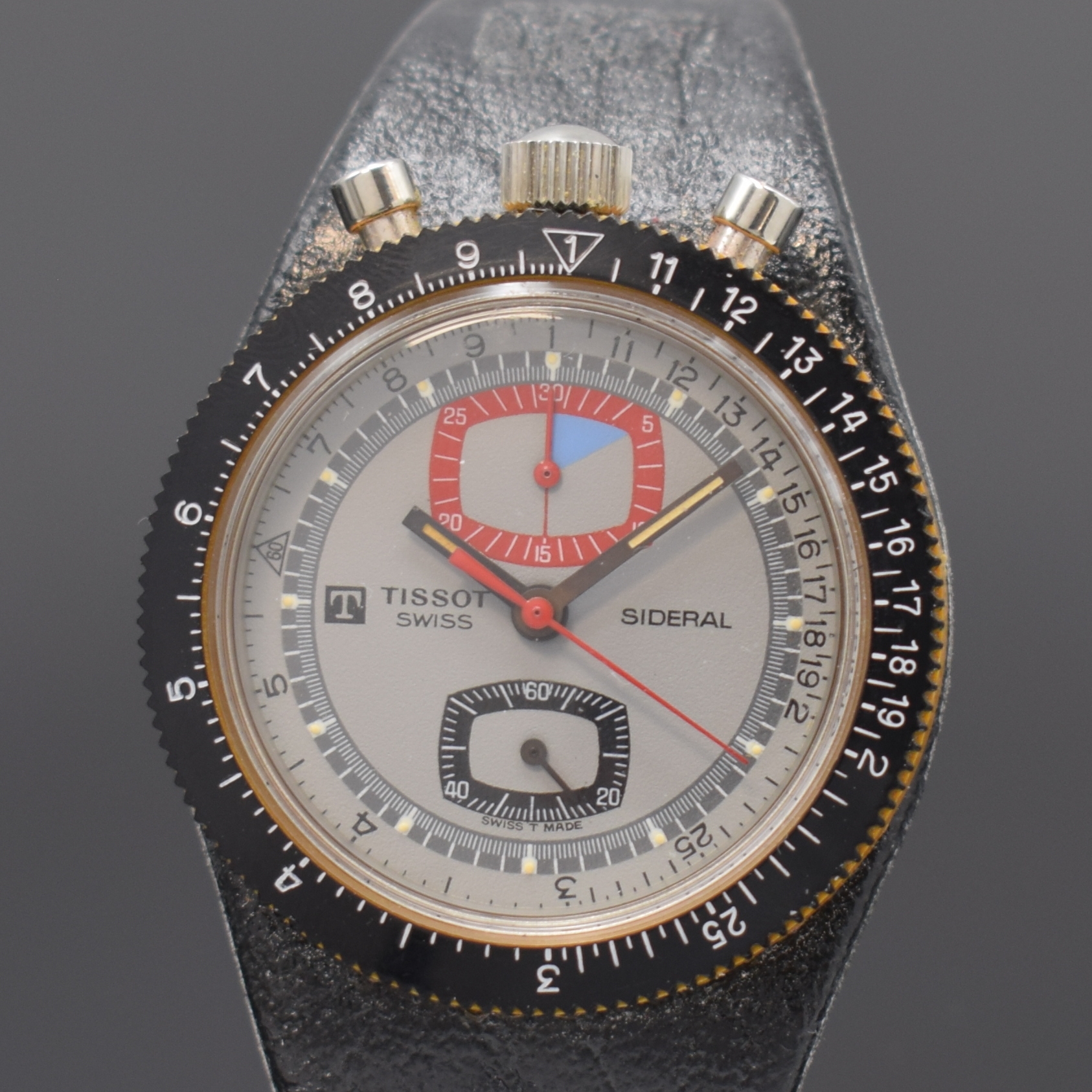 Detail a: TISSOT SIDERAL Herrenarmbanduhr mit Chronograph, Schweiz um 1968, pultförmiges Monocoque Fiberglas-Geh. inkl. integr. orig. Lederband m. Dornschl., ...