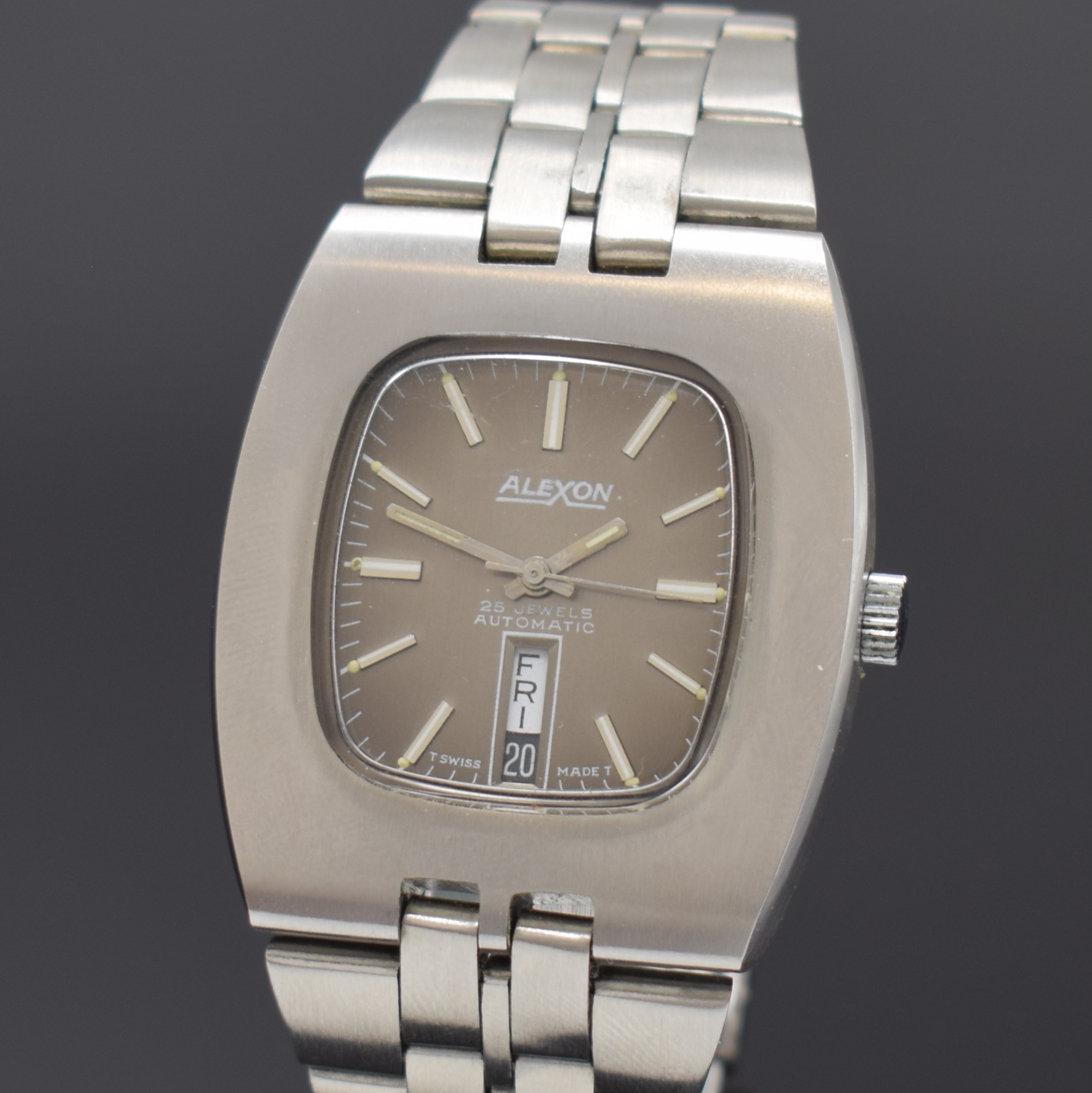 Detail a: ALEXON Herrenarmbanduhr, Automatik, Schweiz um 1965, Edelstahlgeh. inkl. orig. Gliederband m. Faltschl., Boden verschr., graues Zifferbl. m. aufges. ...