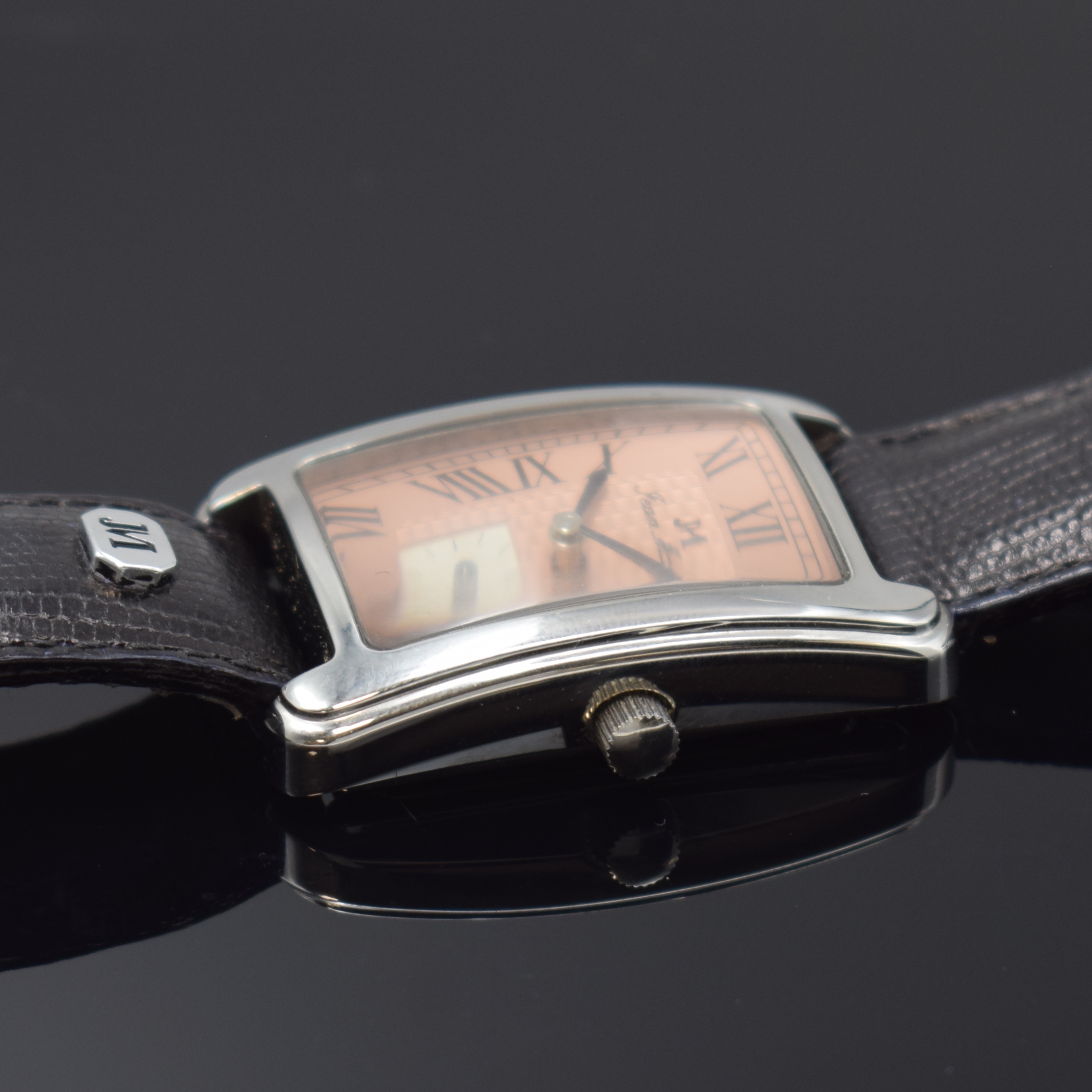 Detail c: JEAN MARCEL rechteckige Armbanduhr in Stahl, Schweiz um 1990, Handaufzug, beids. vergl. Geh., Boden 4-fach verschr., lachsfarb. Zifferbl. m. ...