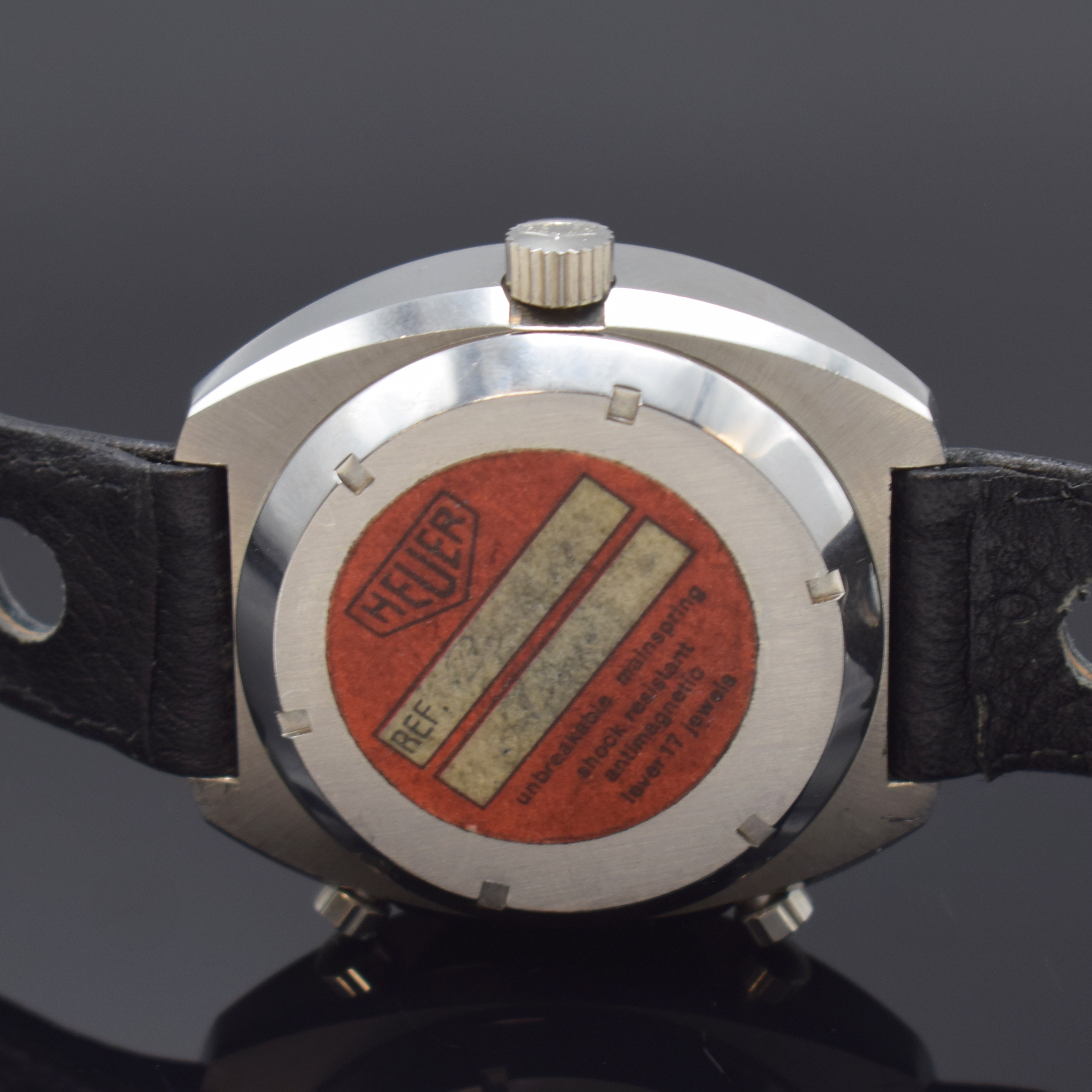 Detail d: HEUER Montreal Referenz 110.503 Armbanduhr mit Chronograph in Stahl, Schweiz um 1975, Automatik, 2-tlg. Geh., Boden m. orig. Stickerverschr., orig. ...