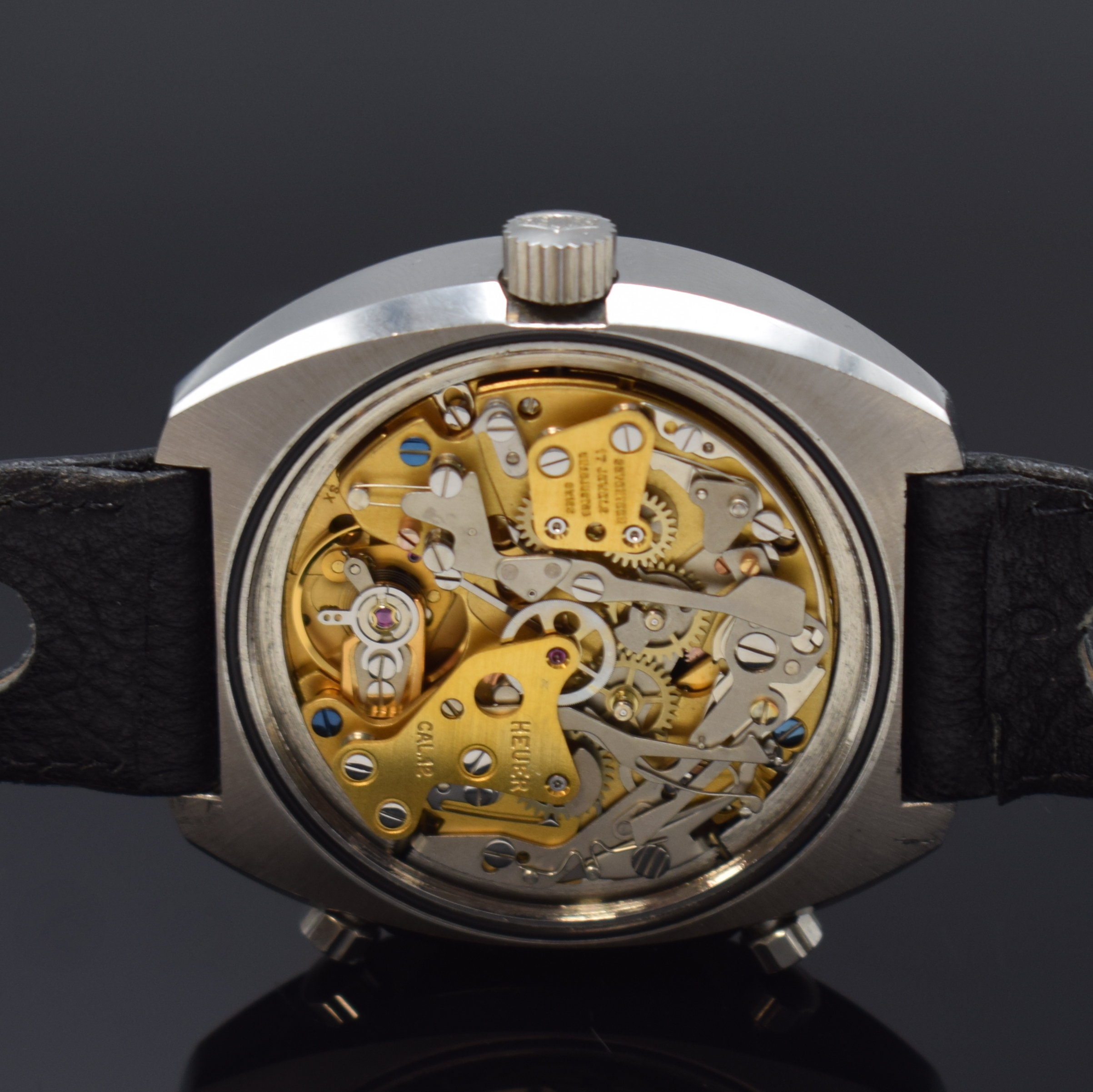 Detail e: HEUER Montreal Referenz 110.503 Armbanduhr mit Chronograph in Stahl, Schweiz um 1975, Automatik, 2-tlg. Geh., Boden m. orig. Stickerverschr., orig. ...