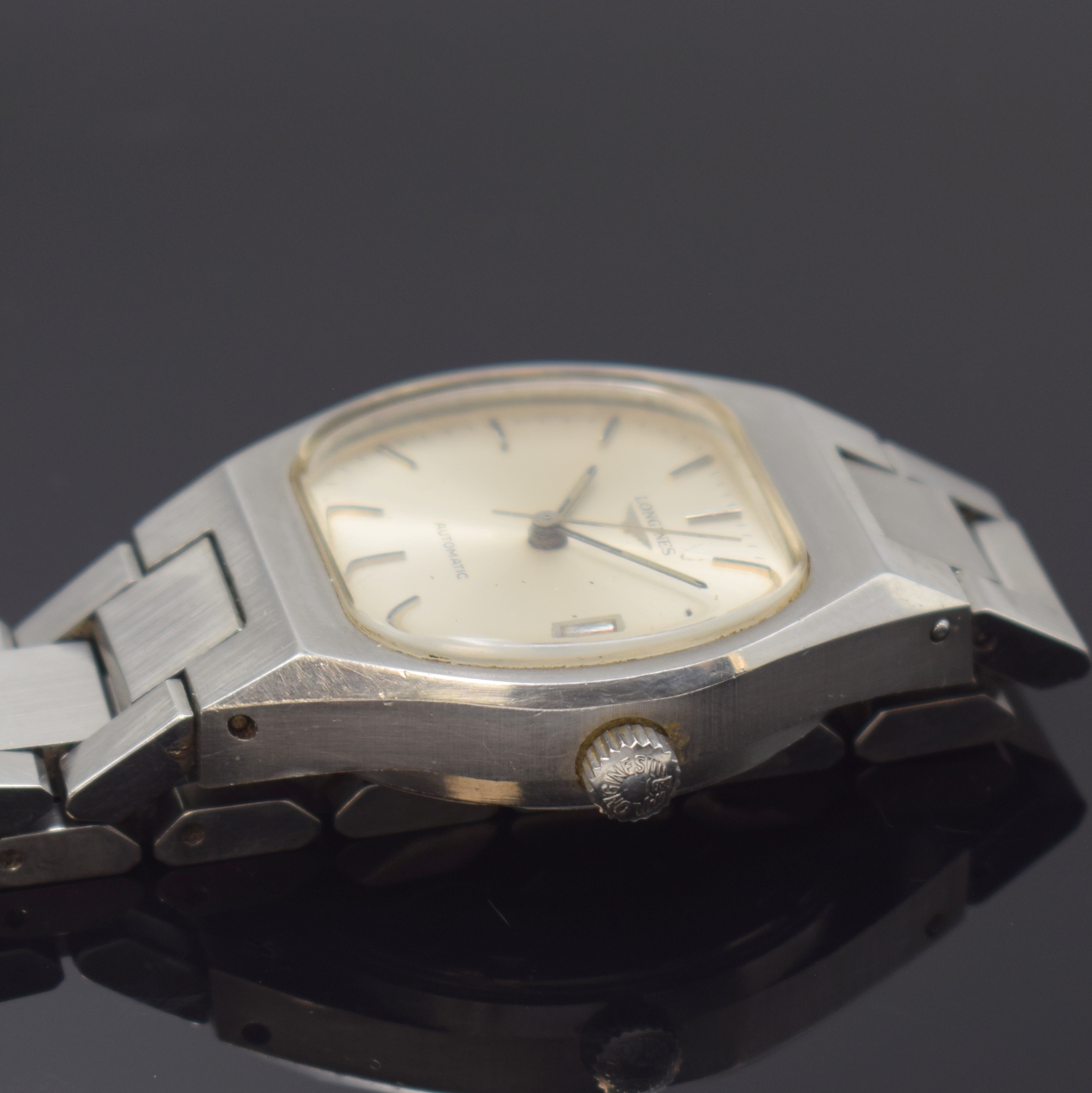 Detail c: LONGINES Armbanduhr in Stahl/Stahlband, Schweiz um 1975, Automatik, 2-tlg. Geh. m. integr. orig. Band, Boden verschr., orig. Krone, silb. Zifferbl., ...