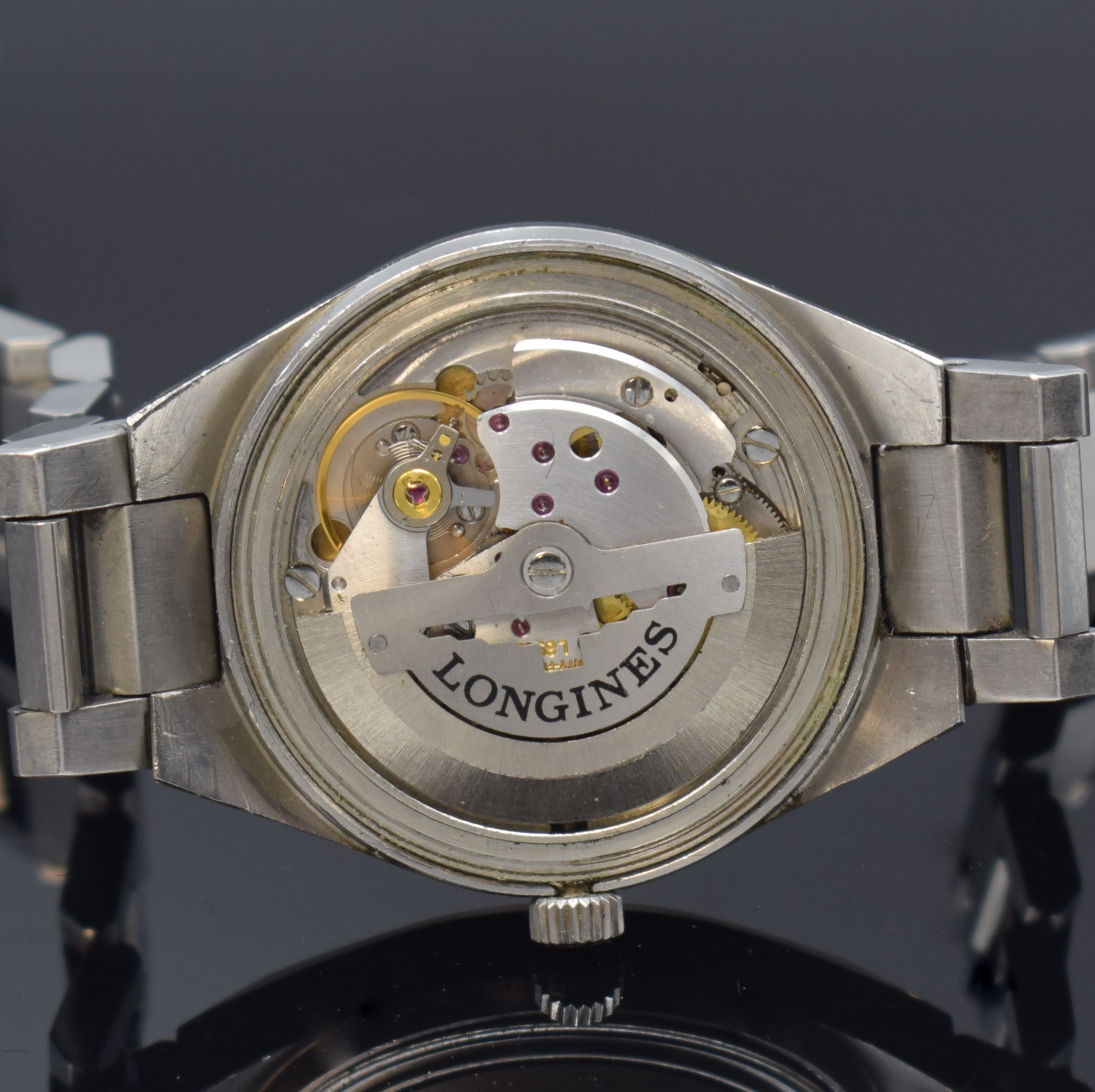 Detail e: LONGINES Armbanduhr in Stahl/Stahlband, Schweiz um 1975, Automatik, 2-tlg. Geh. m. integr. orig. Band, Boden verschr., orig. Krone, silb. Zifferbl., ...