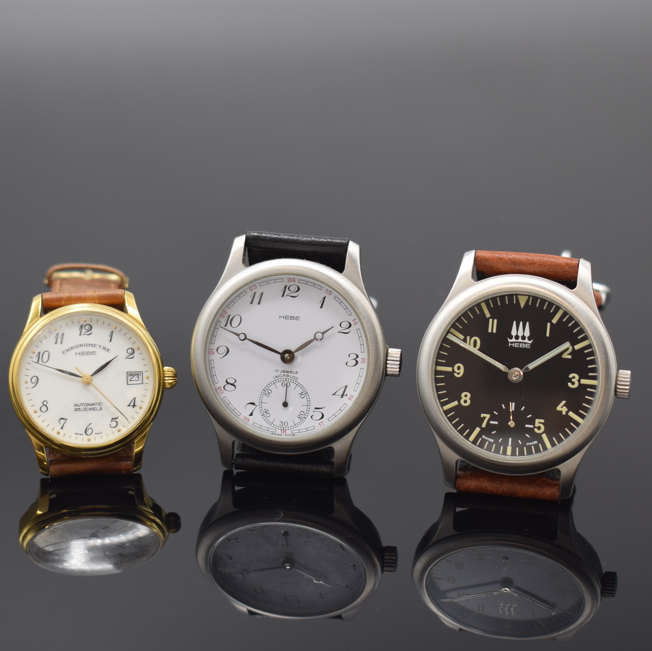 HEBE 3 nahezu neuwertige Armbanduhren, Schweiz um 2000, 2 x große, satinierte Stahlgeh. m. aufgedr. Böden, Zifferblätter m. kl. Sek. b. 6, 1 x ...