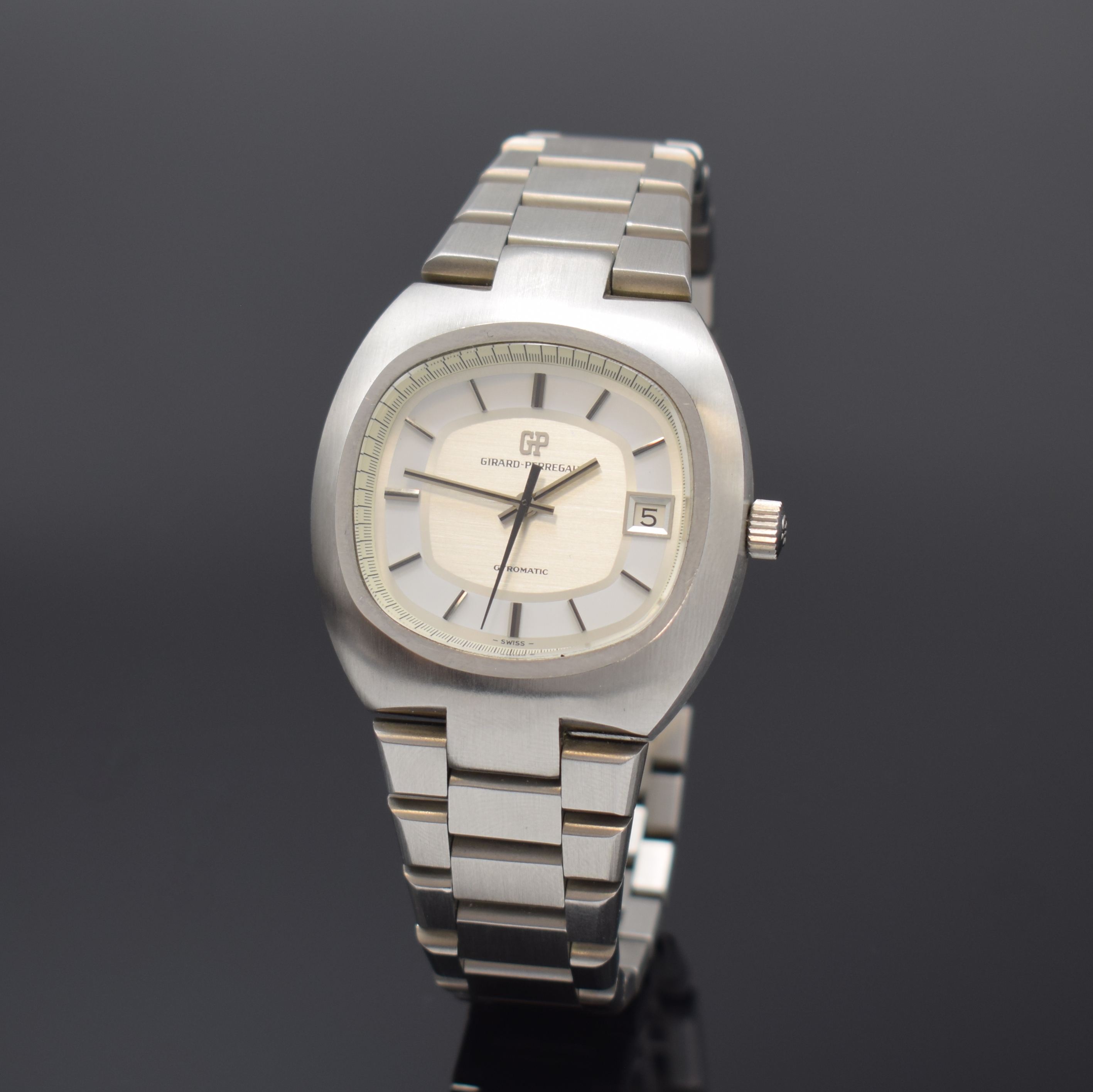 GIRARD PERREGAUX Gyromatic Herrenarmbanduhr in Stahl/Stahlband, Schweiz um 1975, Automatik, verschr. Geh. m. integr. orig. Band, silb. ...
