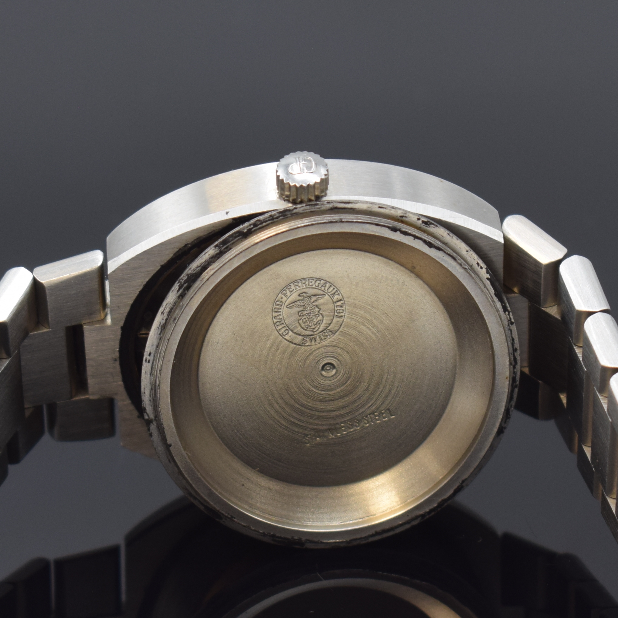 Detail g: GIRARD PERREGAUX Gyromatic Herrenarmbanduhr in Stahl/Stahlband, Schweiz um 1975, Automatik, verschr. Geh. m. integr. orig. Band, silb. ...
