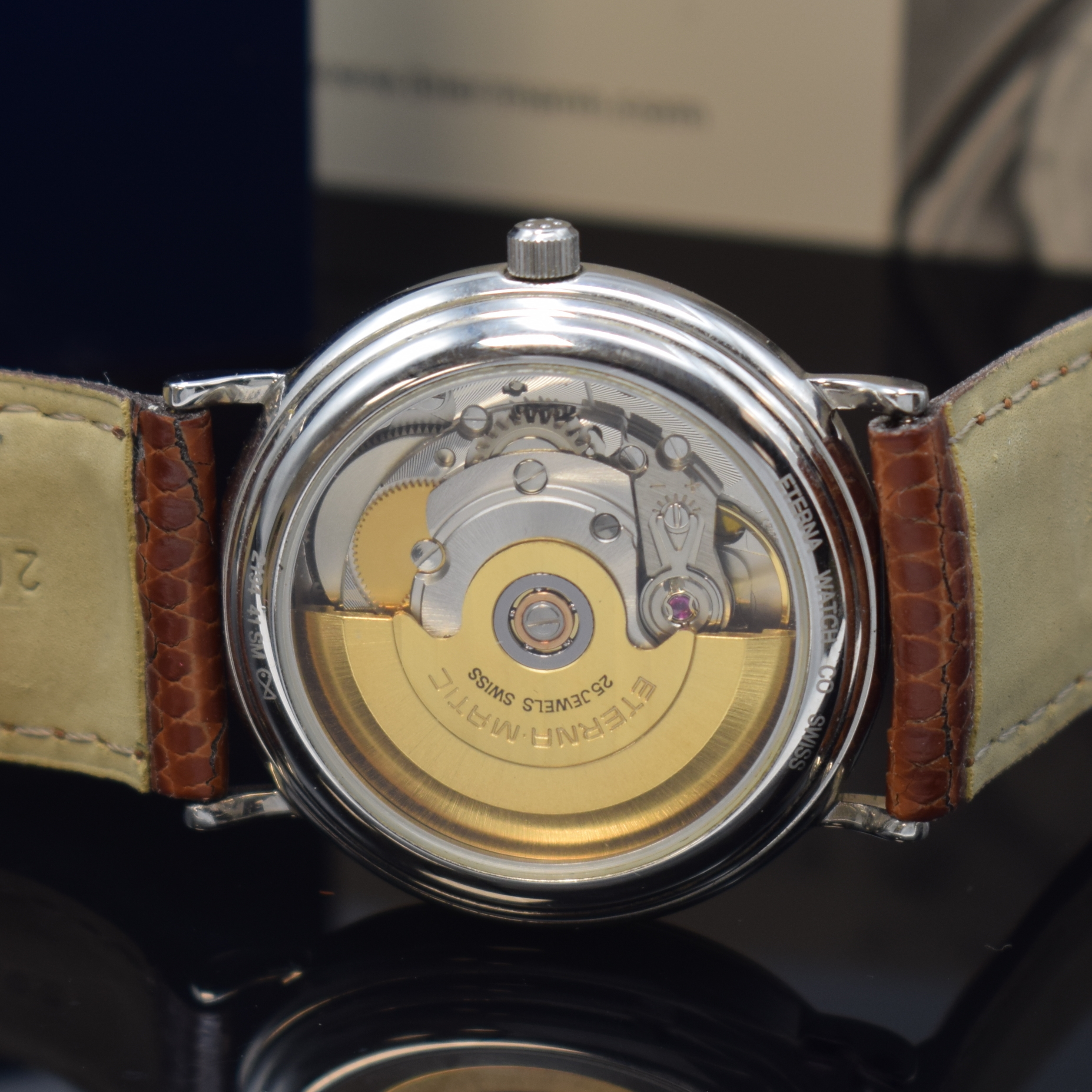 Detail d: ETERNA-MATIC Armbanduhr in Stahl, Schweiz um 2000, Automatik, beids. vergl. Geh., Boden aufgedr., silb. Zifferbl., silb. Indizes u. Zeiger, Datum b. ...