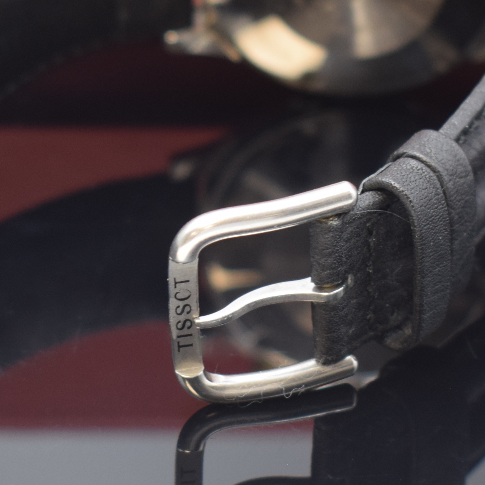 Detail b: TISSOT PRX Armbandchronograph, Schweiz um 1990, Automatik, Stahlgeh. m. verg. 12-eckiger Lünette, Boden verschr., schwarz. Waffel- Zifferbl., gold. ...