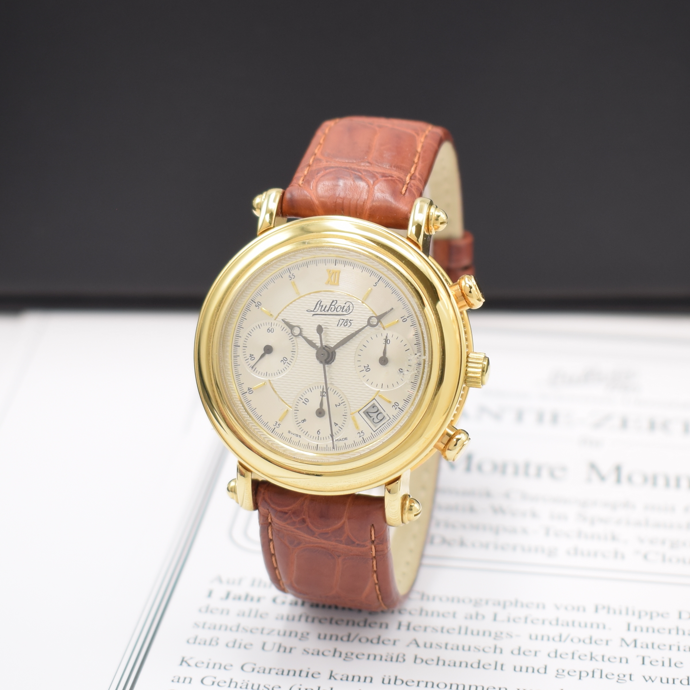 DU BOIS vergoldeter Armbandchronograph, Schweiz lt. orig. Pap. verk. 1989, Automatik, beids. vergl. Geh. m. Münzrand, Boden aufgedr., silb. ...