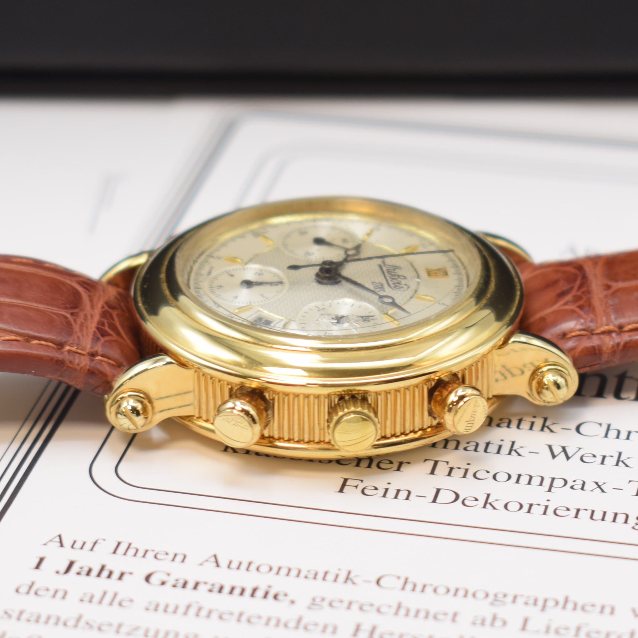 Detail b: DU BOIS vergoldeter Armbandchronograph, Schweiz lt. orig. Pap. verk. 1989, Automatik, beids. vergl. Geh. m. Münzrand, Boden aufgedr., silb. ...