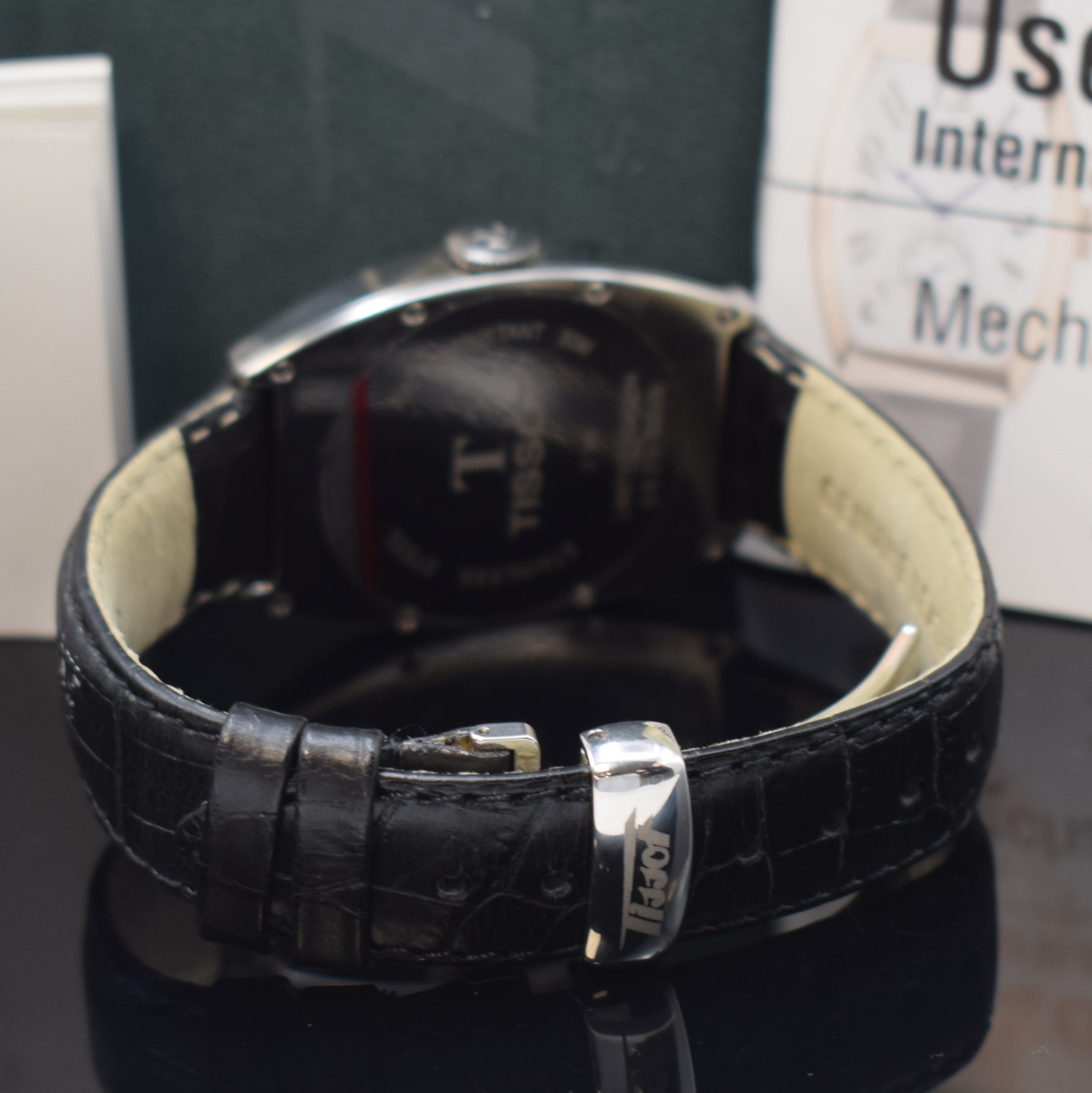 Detail b: TISSOT Porto auf 6666 Stück limitierte Armbanduhr in Stahl, Schweiz lt. orig. Pap. verk. 2001, Handaufzug, tonneauförm. Geh., Boden 8-fach ...