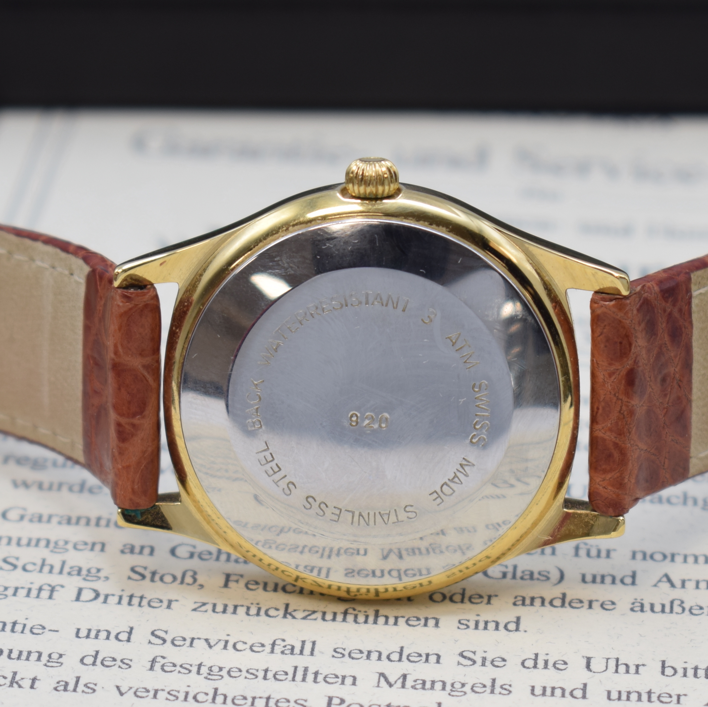 Detail c: BUREN Grand Prix vergoldete Armbanduhr, Schweiz lt. orig. Pap. verk. 2001, Automatik, 2-tlg. Geh., Stahlboden aufgedr., silb. Duoton-Zifferbl., gold. ...