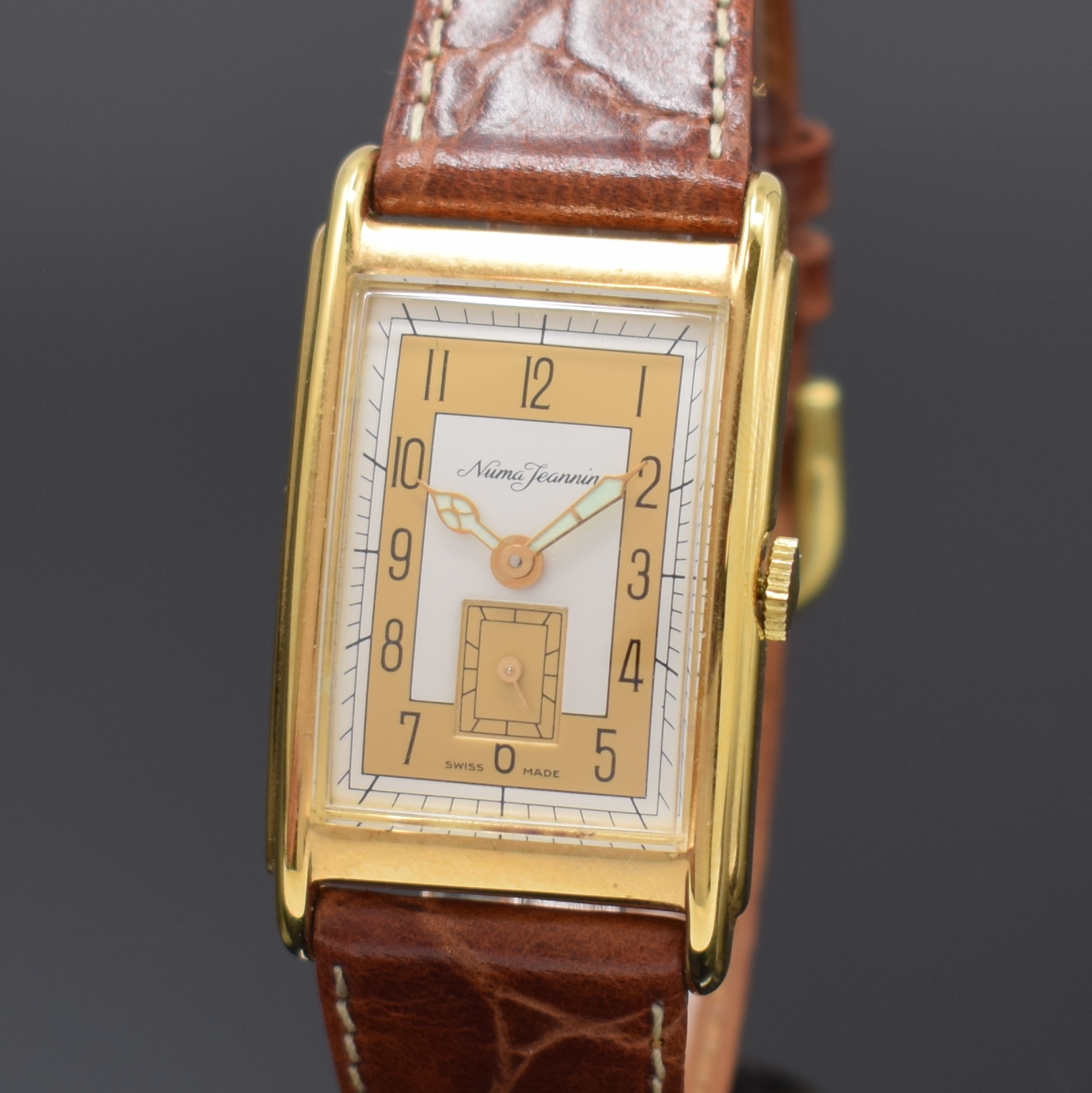 Detail a: NUMA JEANNIN Armbanduhr, Schweiz um 1996, Design der 1930er Jahre, Handaufzug, verg. Metallgeh., Boden aufgedr., in sich leicht gewölbt, 2-farb. ...