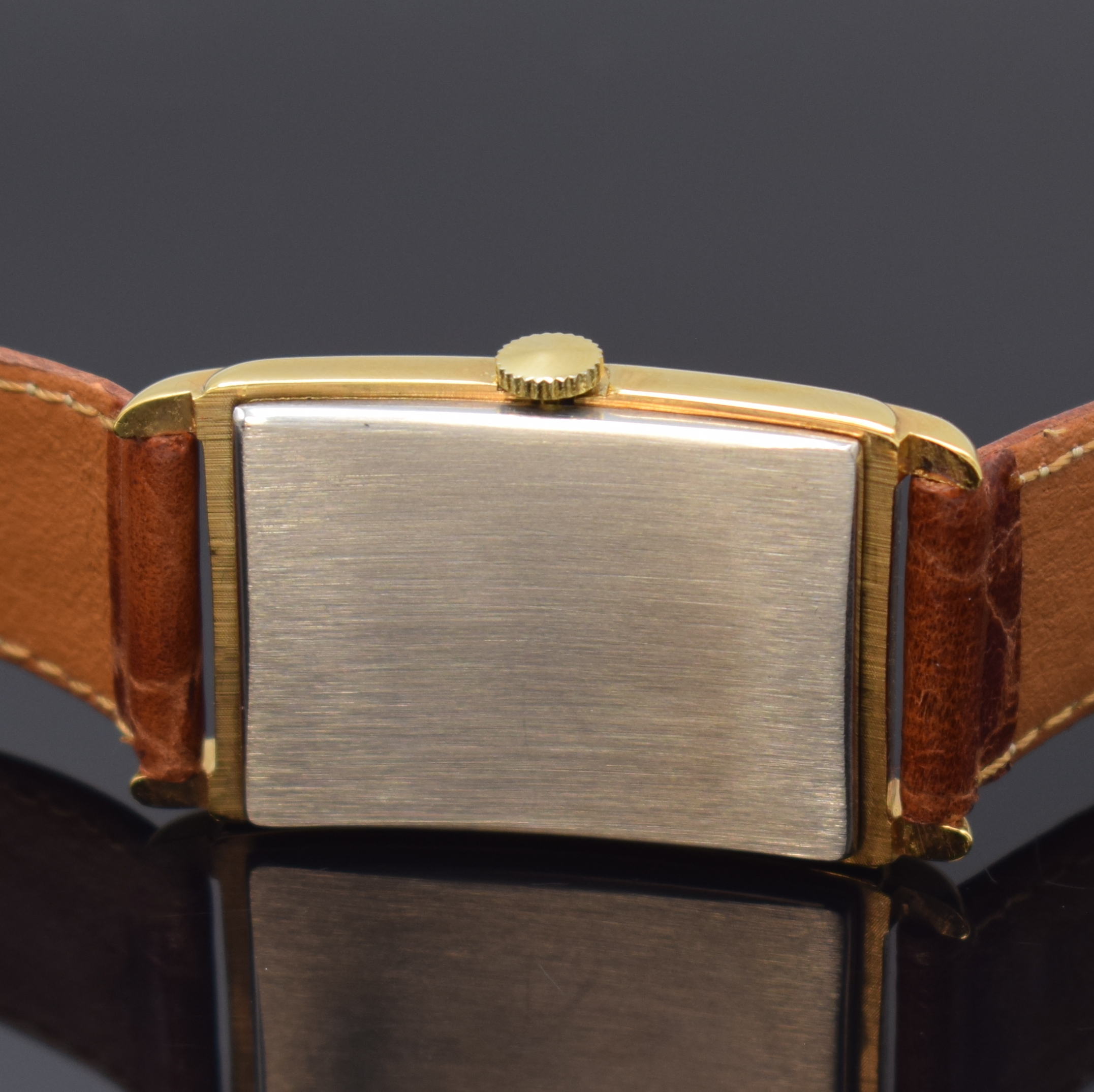 Detail c: NUMA JEANNIN Armbanduhr, Schweiz um 1996, Design der 1930er Jahre, Handaufzug, verg. Metallgeh., Boden aufgedr., in sich leicht gewölbt, 2-farb. ...