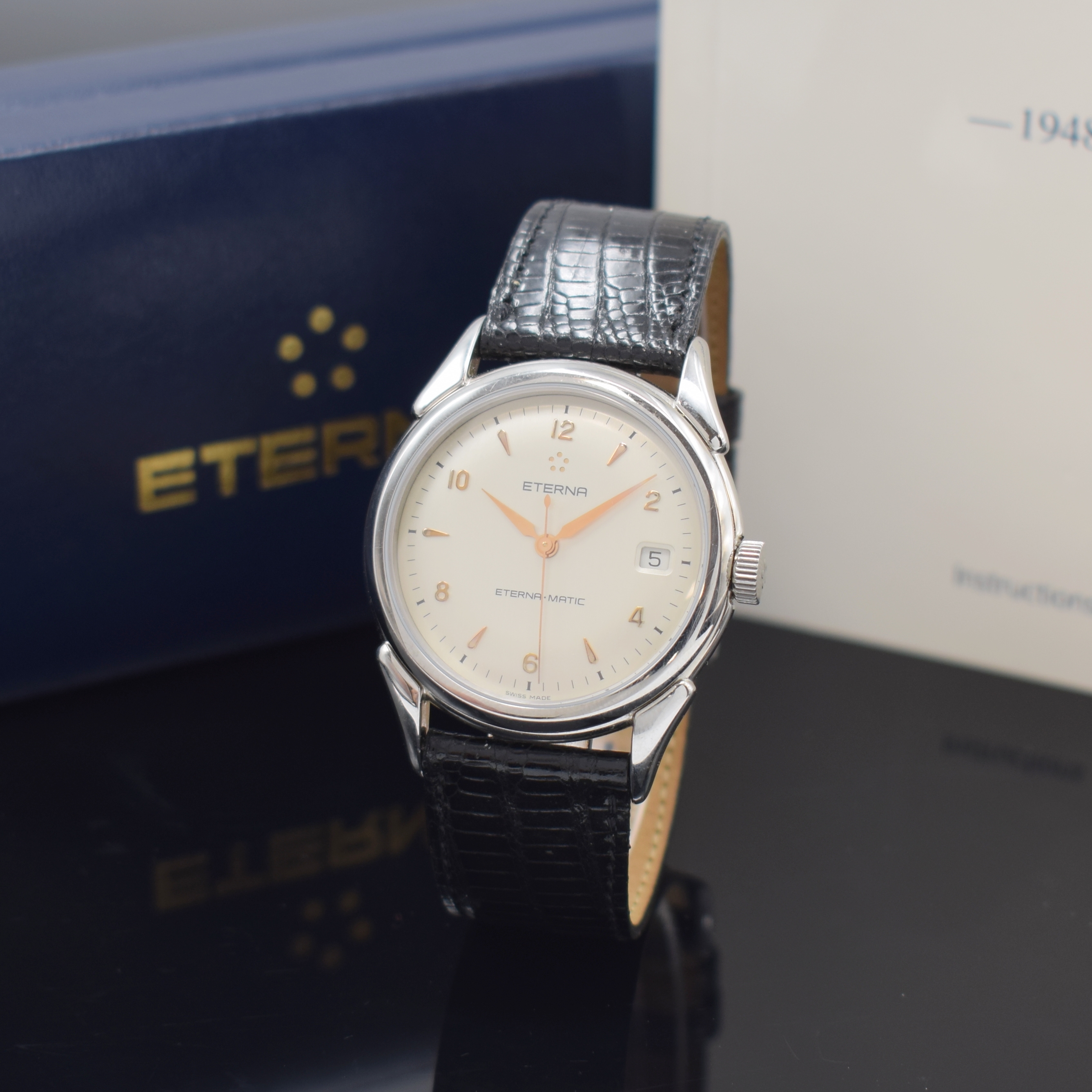 ETERNA-MATIC 1948 Herrenarmbanduhr in Stahl, Schweiz um 1995, Automatik, Boden aufgedr., orig. Lederband m. orig. Dornschl., silb. Zifferbl. m. gold. ...