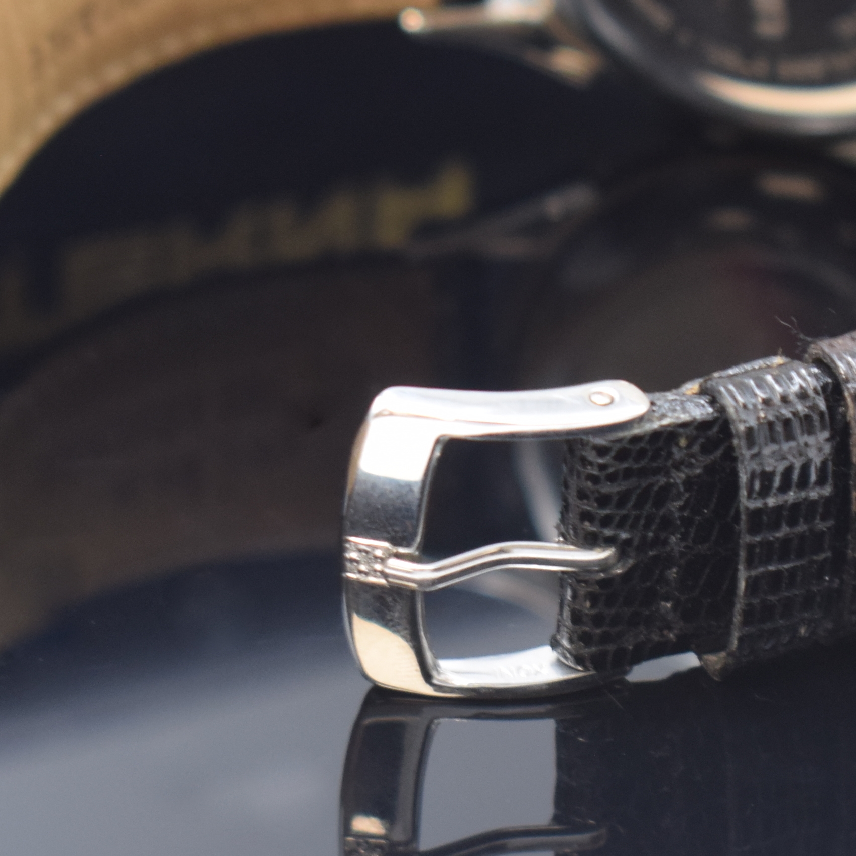 Detail b: ETERNA-MATIC 1948 Herrenarmbanduhr in Stahl, Schweiz um 1995, Automatik, Boden aufgedr., orig. Lederband m. orig. Dornschl., silb. Zifferbl. m. gold. ...