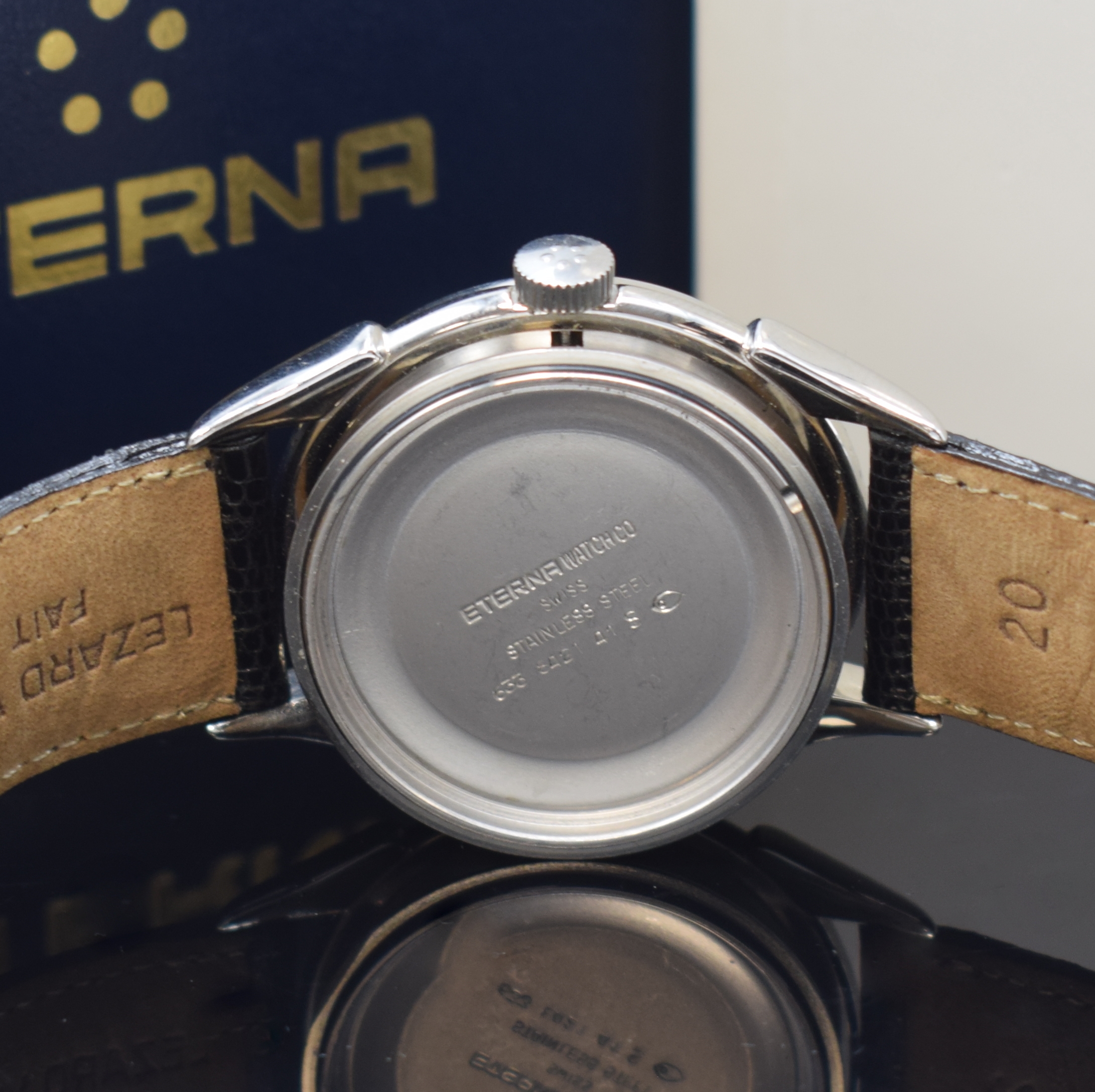 Detail g: ETERNA-MATIC 1948 Herrenarmbanduhr in Stahl, Schweiz um 1995, Automatik, Boden aufgedr., orig. Lederband m. orig. Dornschl., silb. Zifferbl. m. gold. ...