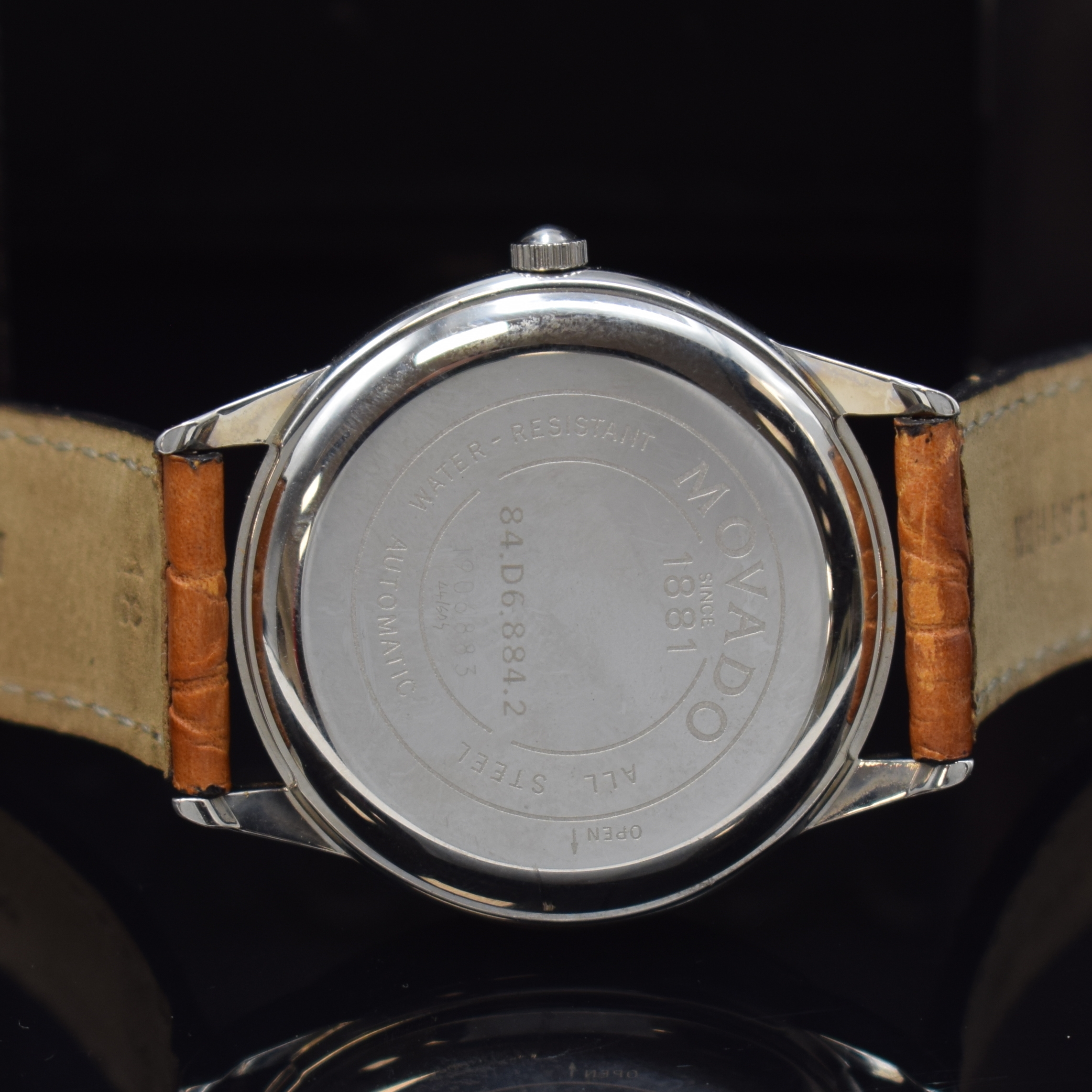 Detail c: MOVADO Armbanduhr Referenz 84-D6-884, Automatik, Edelstahlgeh. inkl. orig. Lederband m. orig. Dornschl., Boden aufgedr., matt. silb. Zifferbl. m. ...