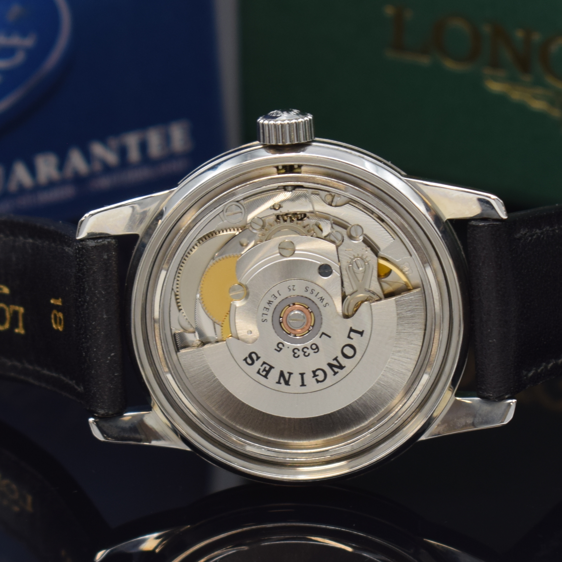 Detail e: LONGINES Conquest Herrenarmbanduhr Referenz L1.611.4, Automatik, Edelstahlgeh. inkl. orig. Lederband m. orig. Dornschl., Boden m. email. Goldplakette ...