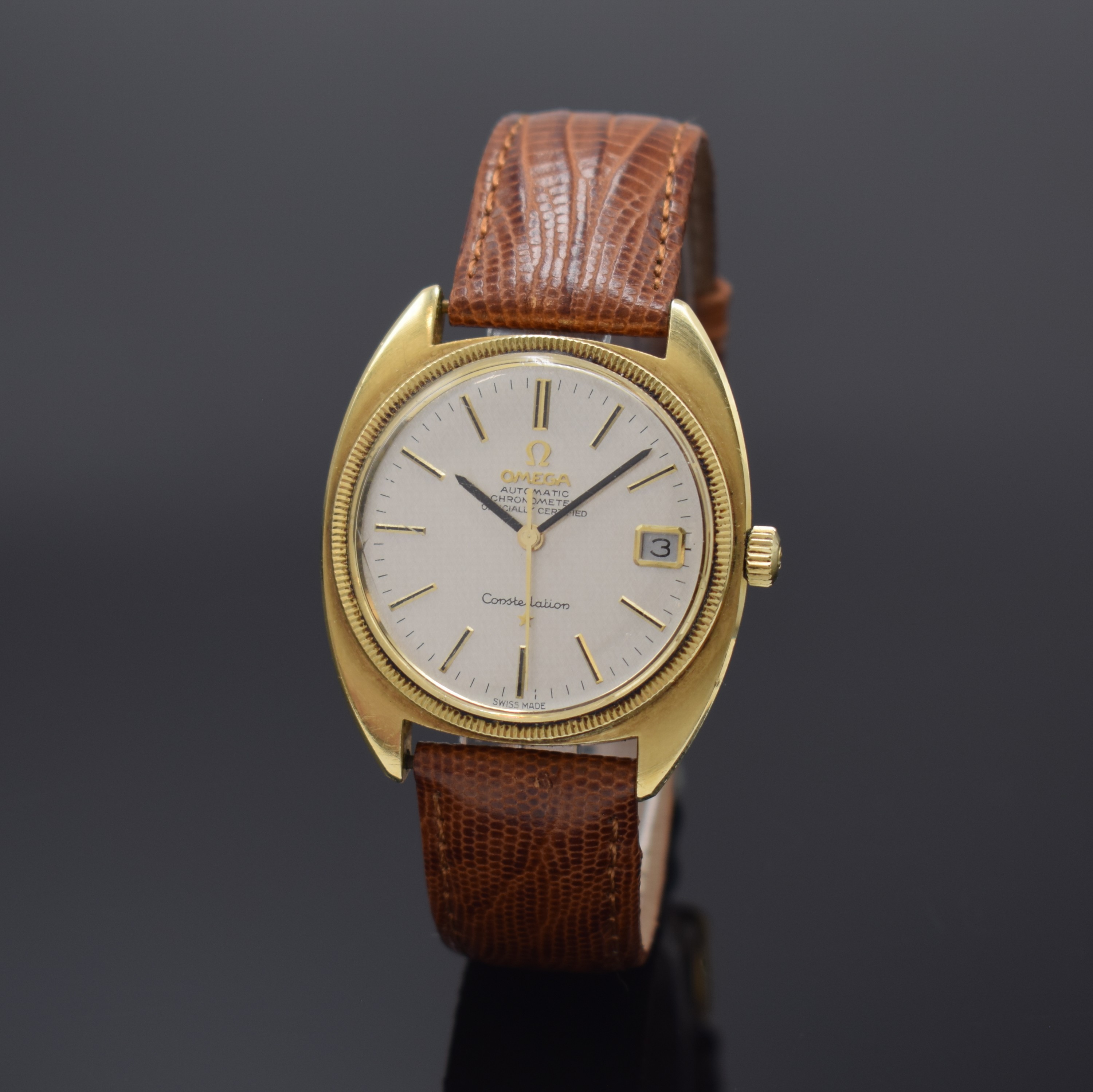 OMEGA Constellation Chronometer Herrenarmbanduhr Referenz 168.027, Automatik, Schweiz um 1968, Edelstahlgeh. m. Goldhaube, geriffelte Lünette, Datum ...
