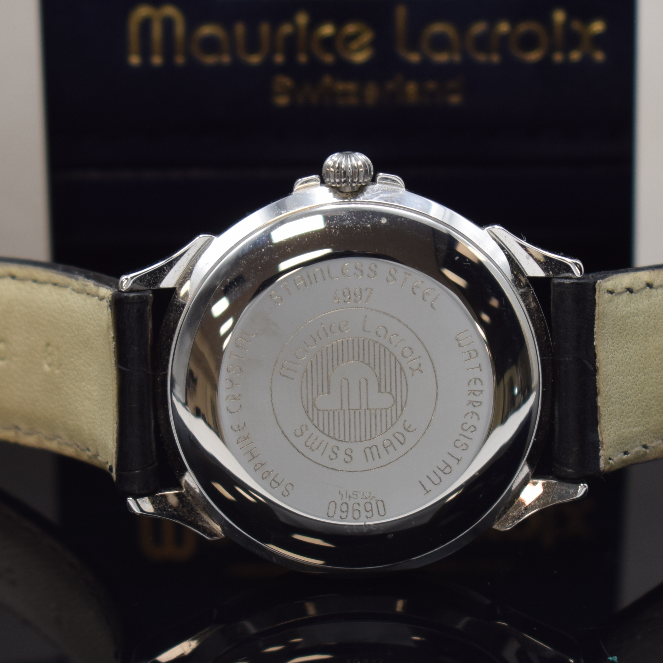 Detail c: MAURICE LACROIX Armbanduhr mit Tag und Datum in Stahl, Schweiz lt. orig. Pap. verk. 2000, Automatik, 2-tlg. Geh., Boden aufgedr., silb./weisses ...
