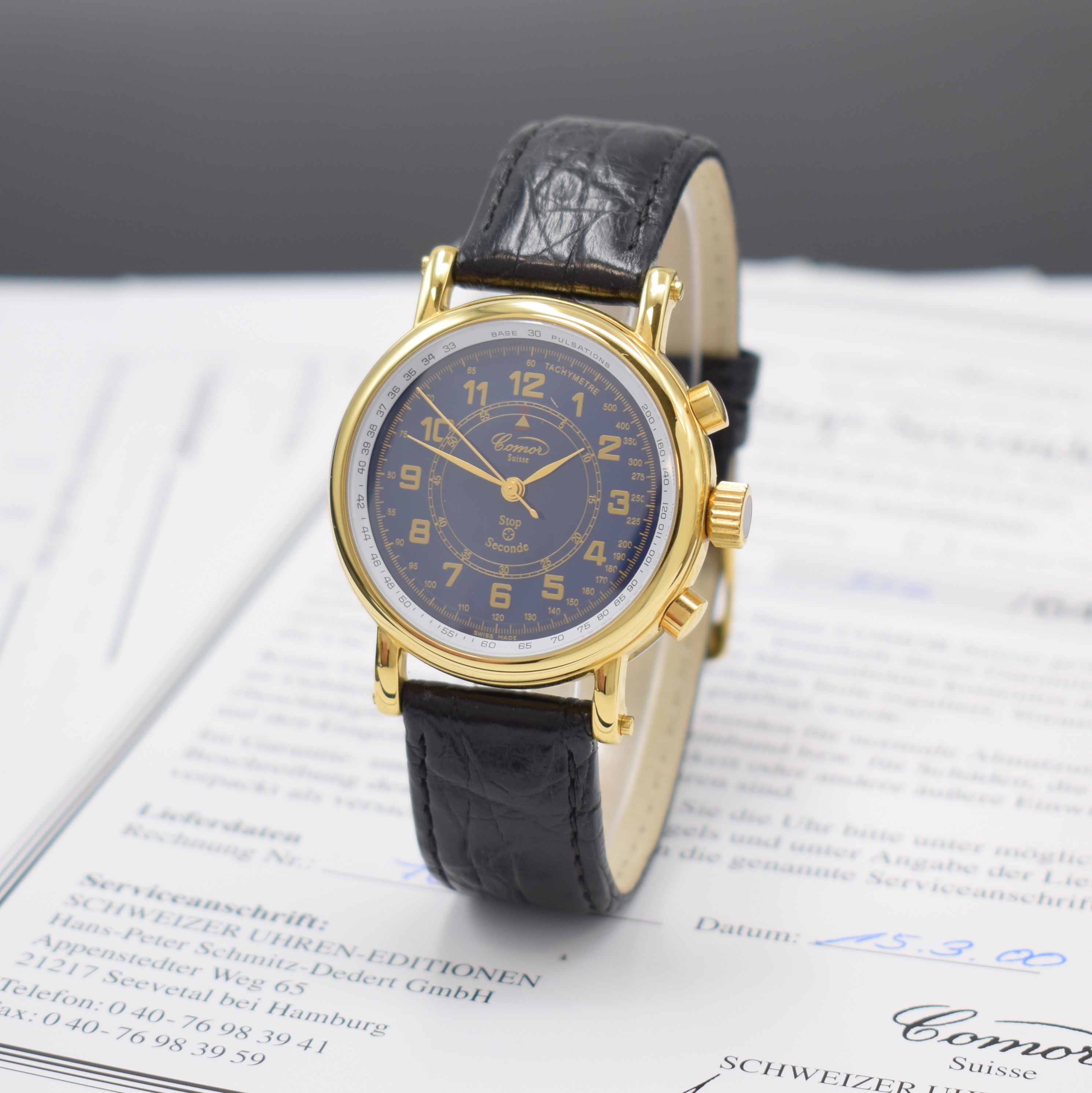 COMOR Stop-Seconde Armbanduhr mit Flyback- Funktion, Schweiz lt. orig. Pap. verk. 2000, Handaufzug, vergold. Geh. m. Stahl Scharnier-boden, blaues ...