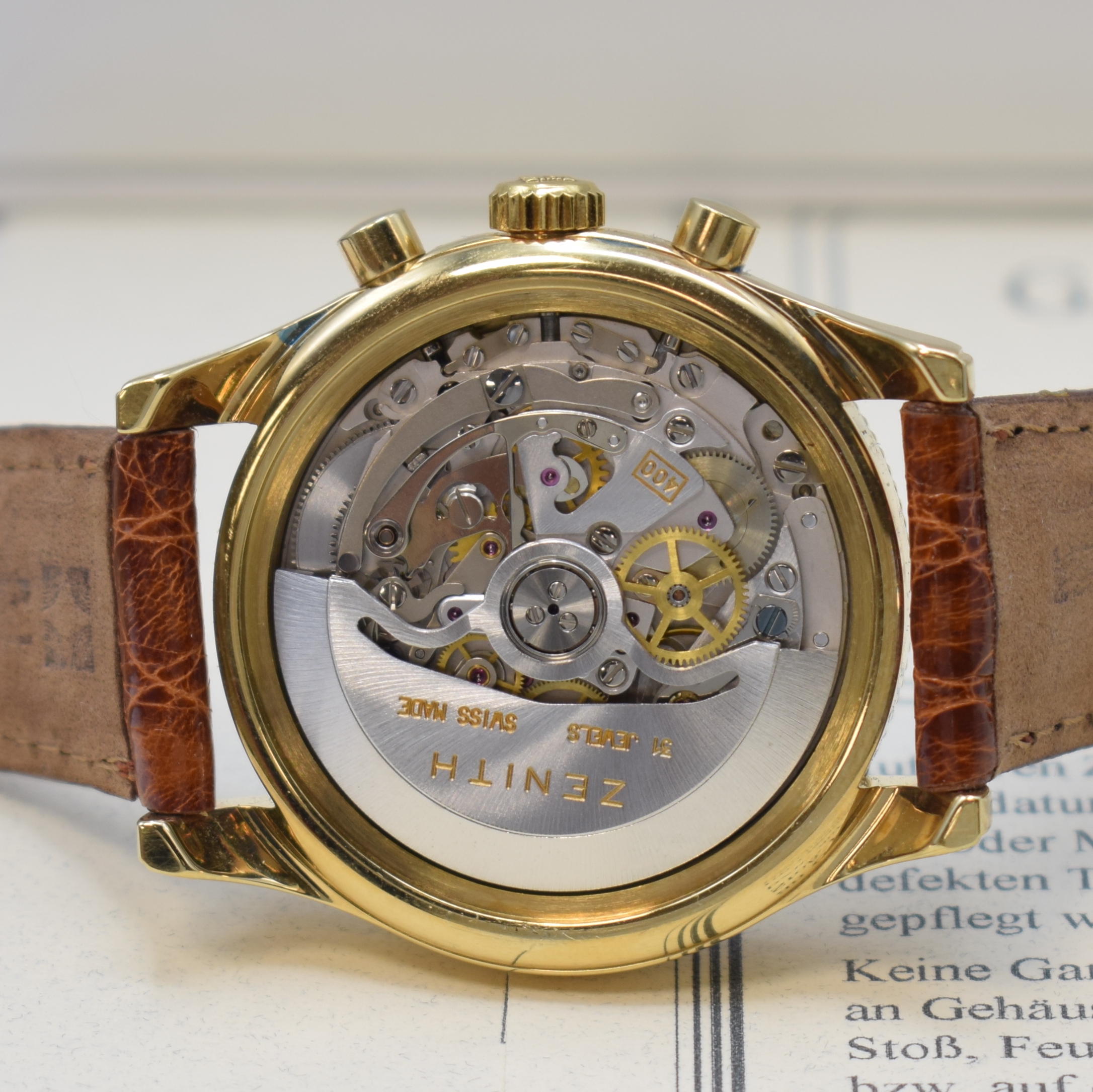Detail e: ZENITH El Primero Schaltradchronograph Referenz 20-0210.400, Schweiz um 1995, Automatik, verg. Geh. m. aufgedr. Stahlboden, weisses Zifferbl., gold. ...