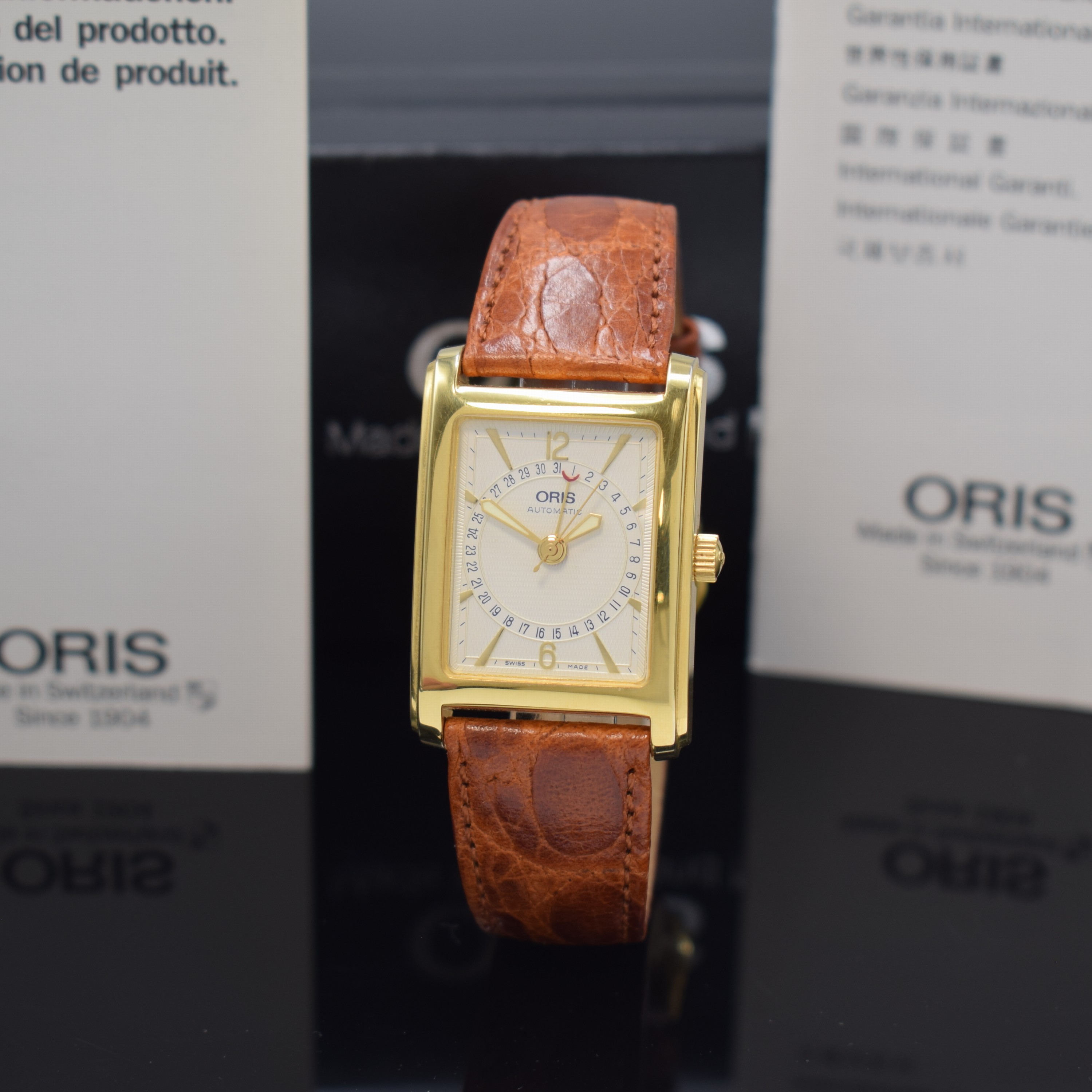 ORIS rechteckige Armbanduhr Referenz B7460, Schweiz um 1995, Automatik, verg. Geh., Stahlboden 4-fach verschr., silb. Strukturzifferbl., gold. ...