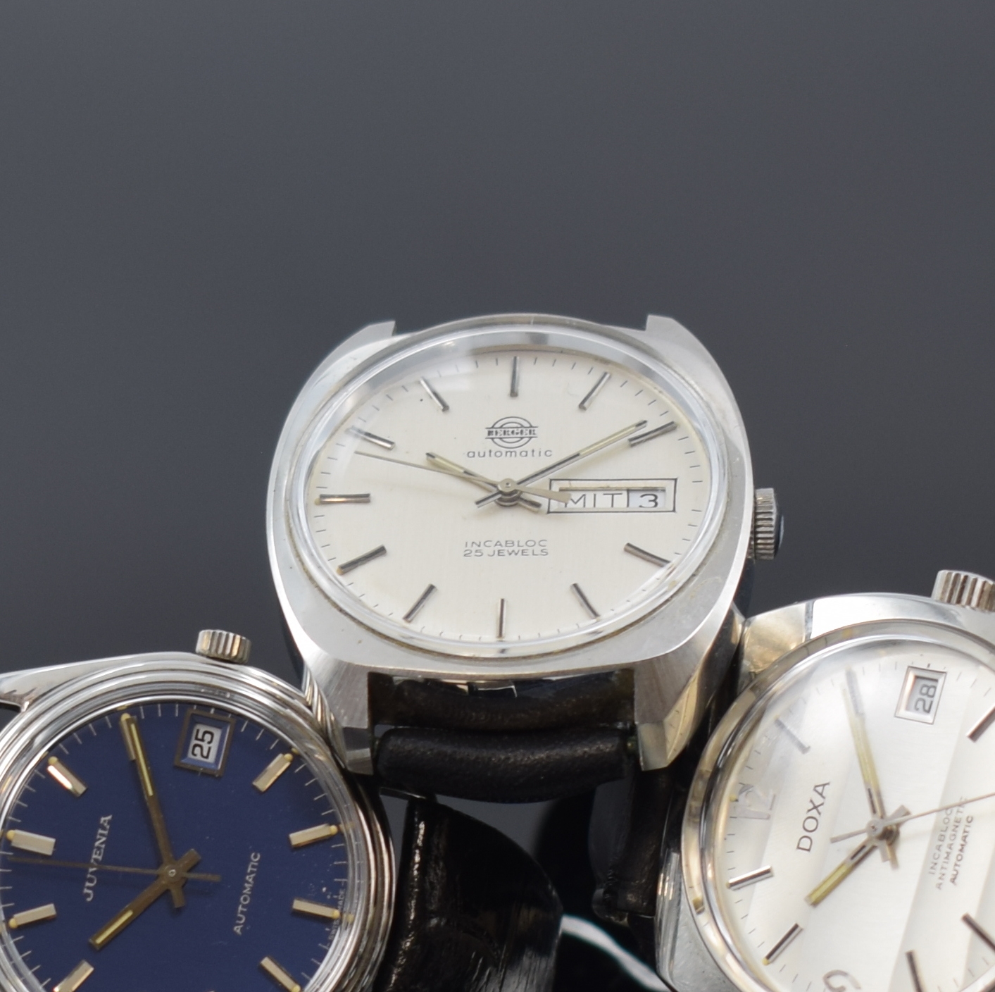 Detail c: Konvolut: 6 Armbanduhren, alle Automatik, 4 x Edelstahl, 2 x verchromt, 1.) Juvenia mit Datum, Referenz 9062R, blaues Zifferbl., Boden verschr., ...