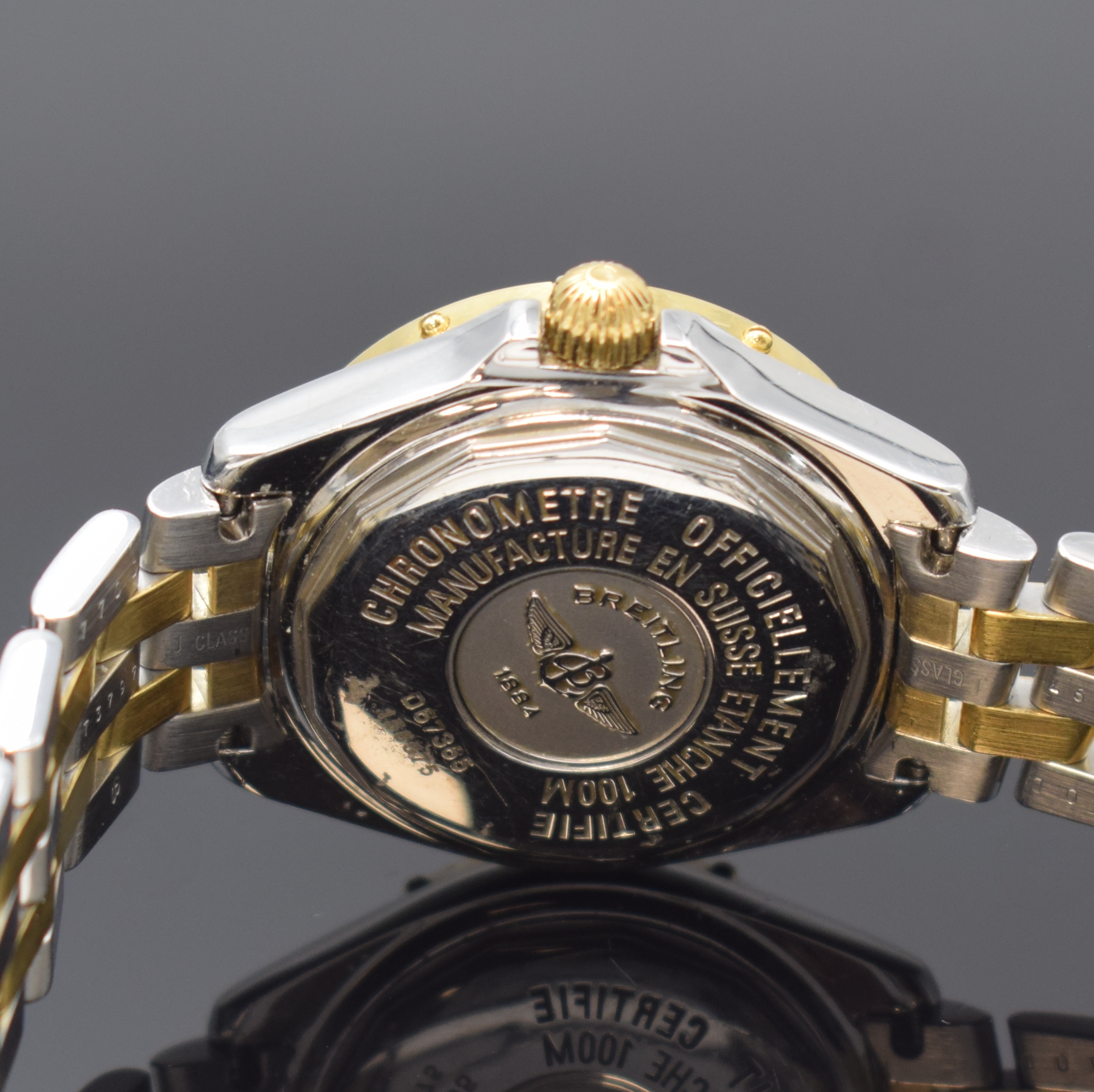 Detail d: BREITLING Damenarmbanduhr Serie Lady J Referenz D67365, Chronometer in Edelstahl/Gold kombiniert inkl. Pilotband, Boden verschr., Saphirgl. entsp. ...