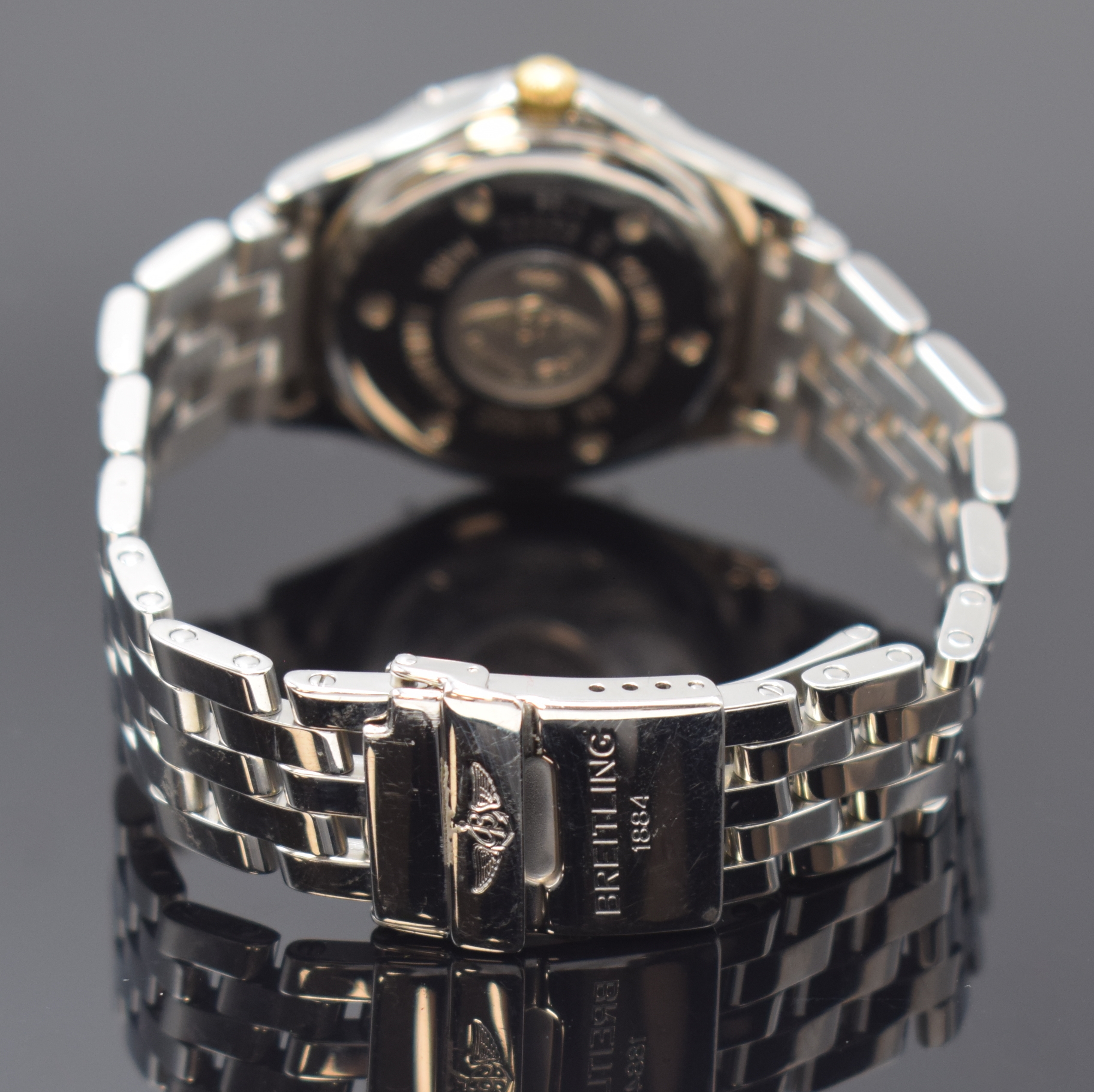 Detail b: BREITLING Damenarmbanduhr Serie Perpetual Sirius Referenz B62022, Schweiz um 1995, Edelstahl/Gold kombiniert inkl. Pilotband m. Faltschl., Boden ...